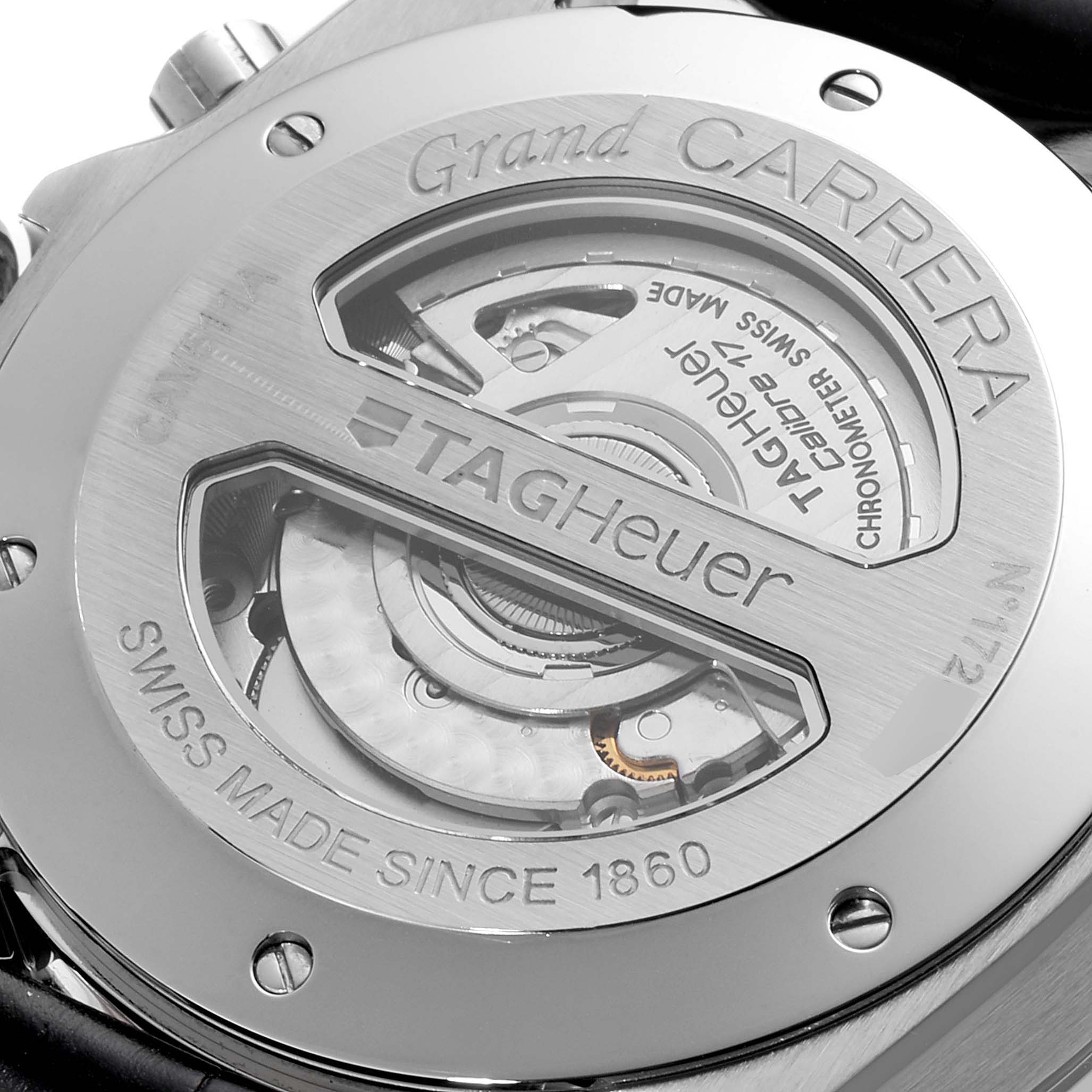 This image shows the back view of a Tag Heuer Carrera CAV511A.FC6225 Men's Stainless Steel Black Dial CAV511A.FC6225 Men's Stainless Steel Black Dial watch, highlighting its inner mechanics and branding.