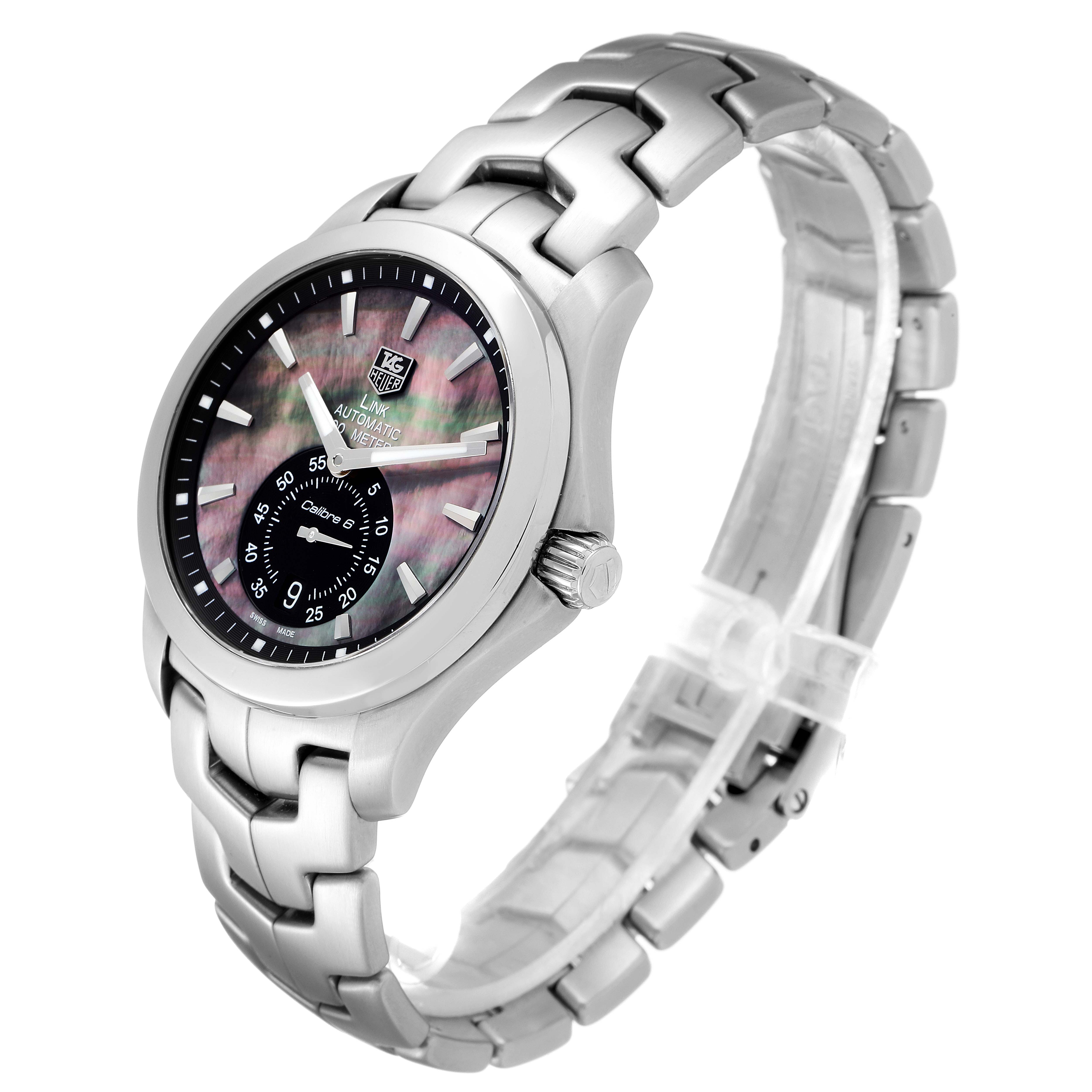 The image shows a Tag Heuer Link WJF211K.BA0570 Men's Stainless Steel Mother of Pearl Dial WJF211K.BA0570 Men's Stainless Steel Mother of Pearl Dial watch captured at a three-quarter angle, highlighting its face, crown, and bracelet.