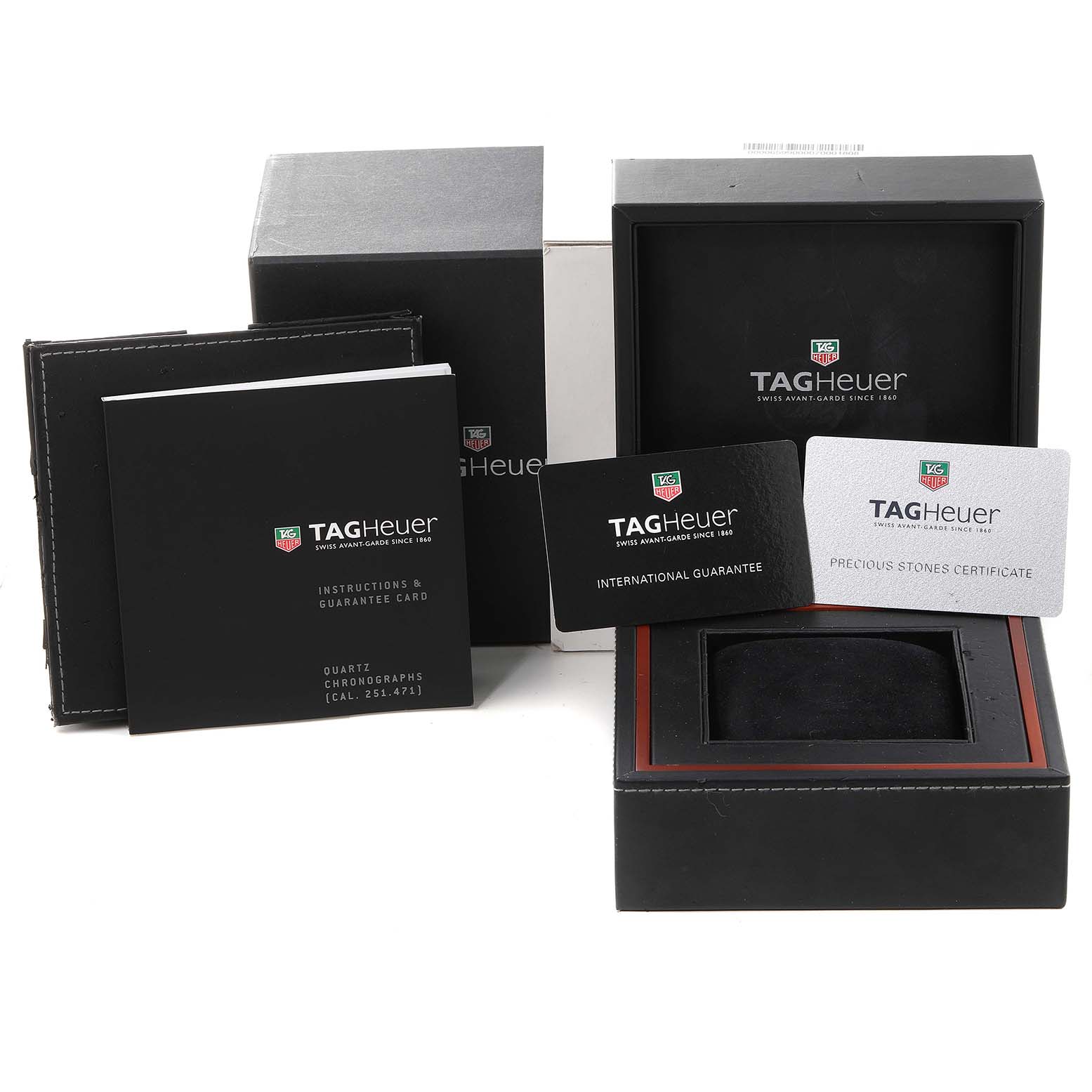 The image shows the packaging, instruction manuals, and guarantee cards for a Tag Heuer Link CJF1314 Women's Stainless Steel Mother of Pearl Dial CJF1314 Women's Stainless Steel Mother of Pearl Dial model watch.