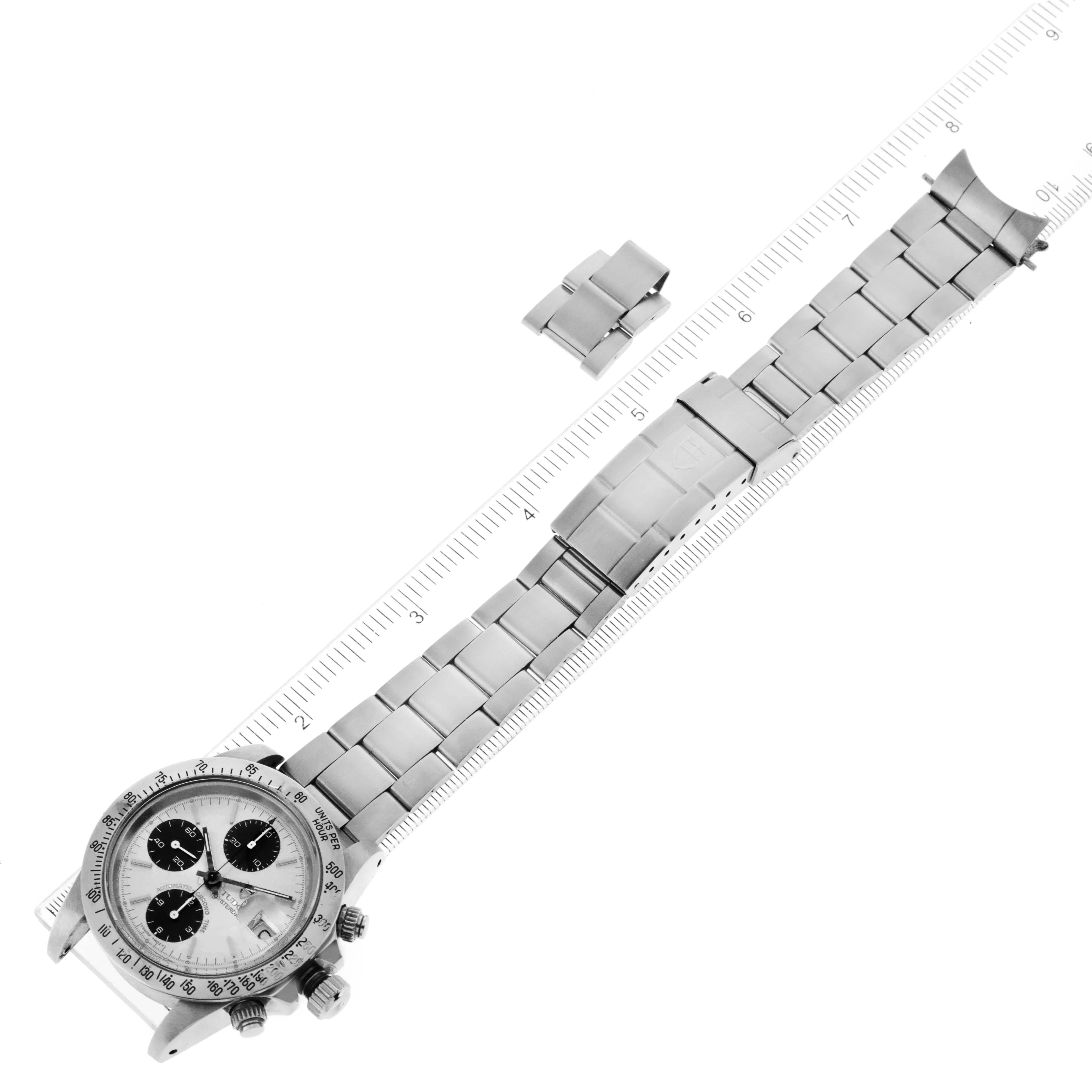 The image shows a Tudor Prince 79180 Men's Stainless Steel Silver Dial 79180 Men's Stainless Steel Silver Dial watch with its full metal strap, laid out alongside a ruler for measurement.