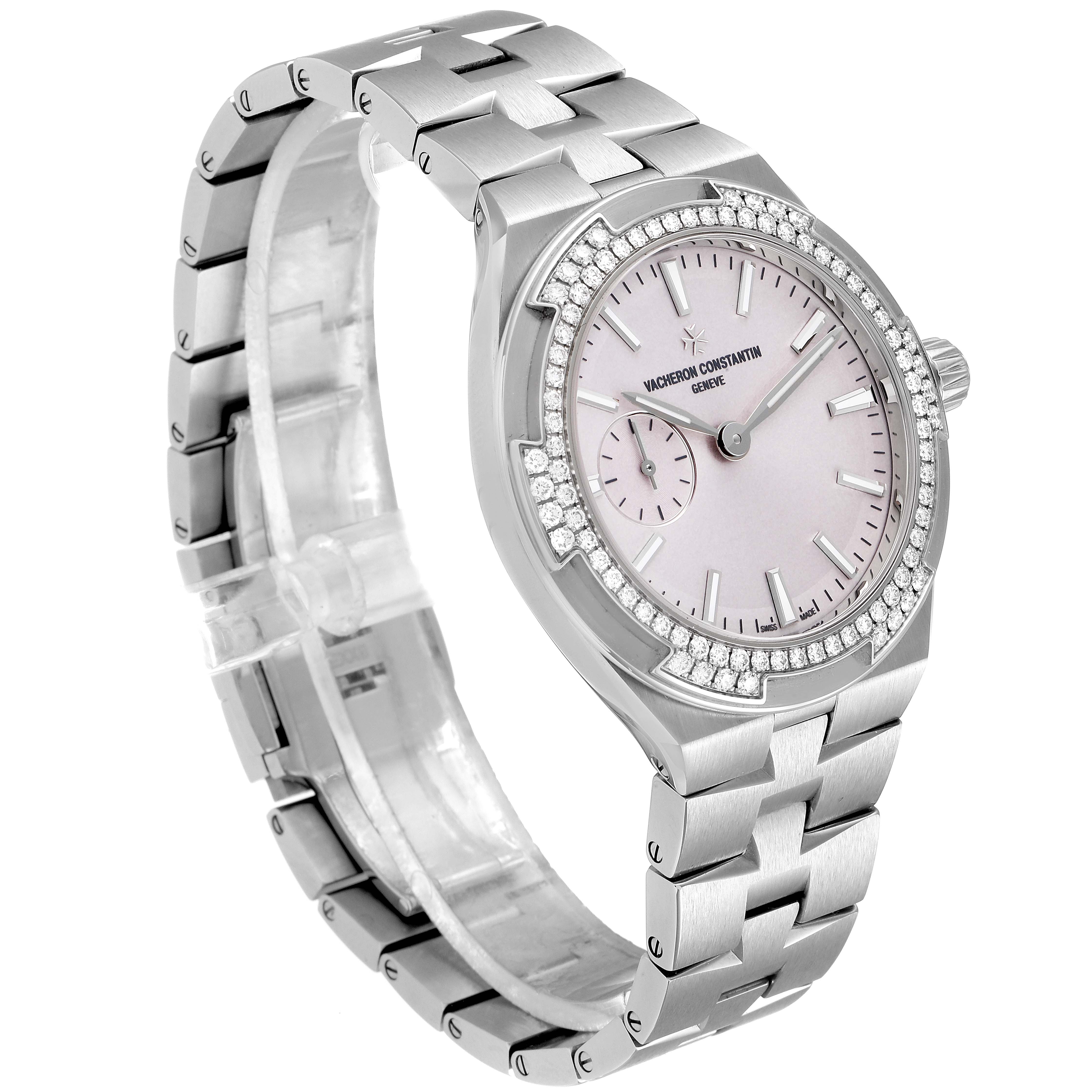 The Vacheron Constantin Overseas 2305V/100A-B078 Women's Stainless Steel Pink Dial 2305V/100A-B078 Women's Stainless Steel Pink Dial watch is shown at an angled side view, highlighting its face, bezel, and bracelet.