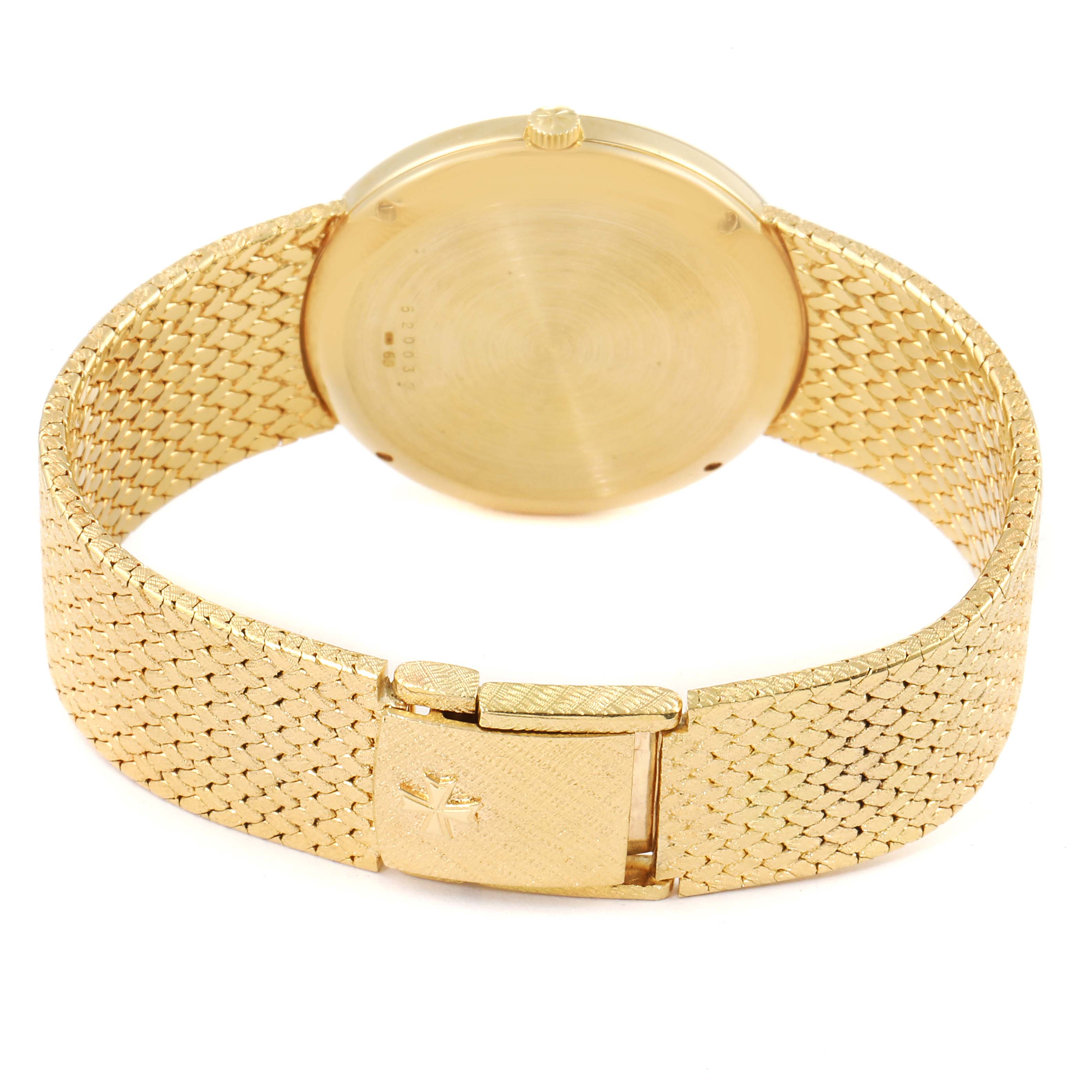 The image shows the backside and clasp of a Vacheron Constantin Patrimony 44012 Men
s Yellow Gold Champagne Dial 44012 Men
s Yellow Gold Champagne Dial watch in gold.