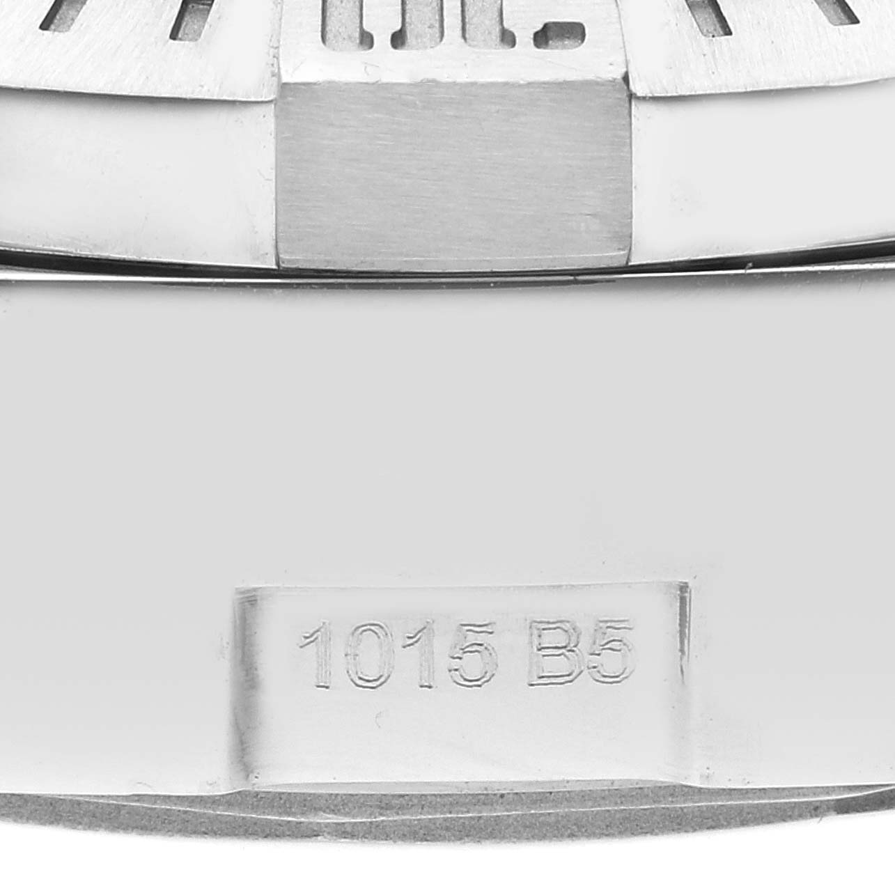 This image shows a close-up of the case back, including what appears to be a part number engraving, of the Breitling Avenger A13381 Men's Stainless Steel Black Dial A13381 Men's Stainless Steel Black Dial watch.