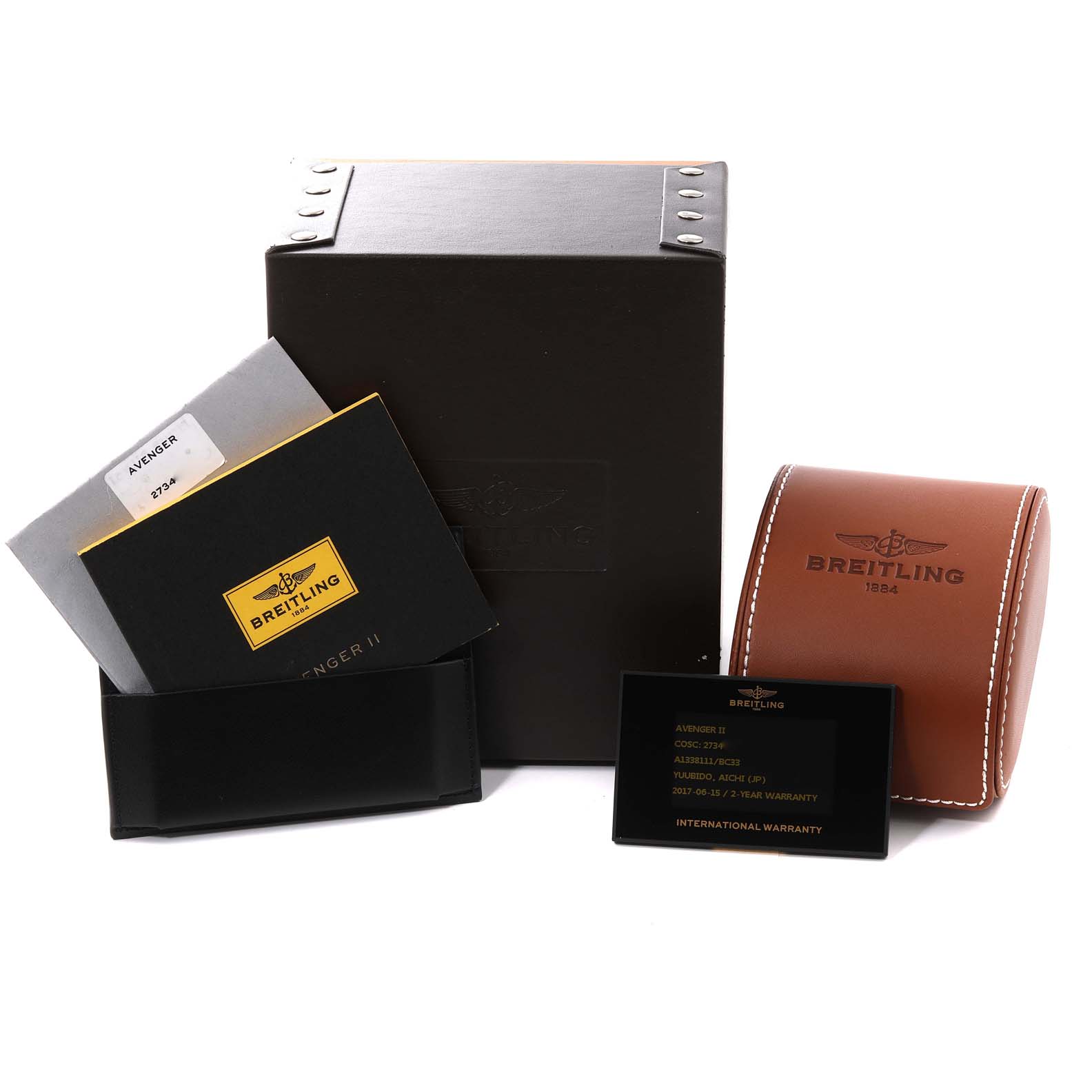 The image shows the packaging, manuals, and warranty card for a Breitling Avenger A13381 Men's Stainless Steel Black Dial A13381 Men's Stainless Steel Black Dial watch.