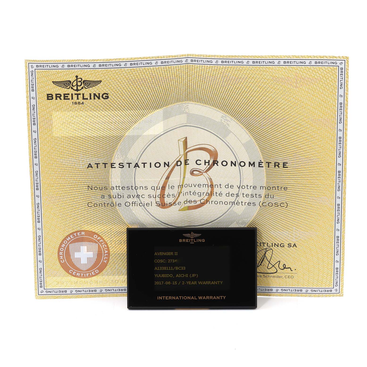 This image shows a Breitling Avenger A13381 Men's Stainless Steel Black Dial A13381 Men's Stainless Steel Black Dial II warranty card and a chronometer certificate.