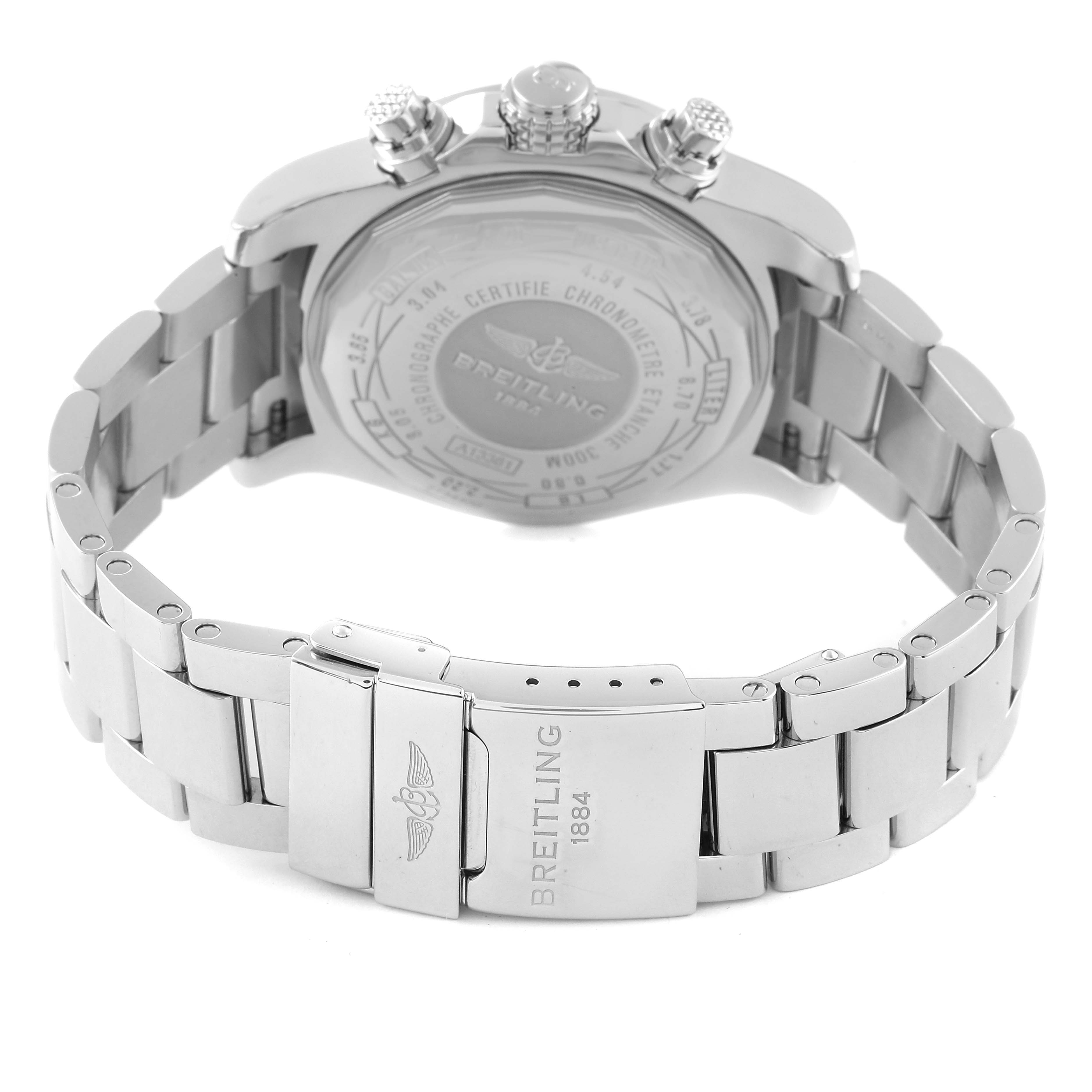 The image shows the back view and clasp of a Breitling Avenger A13381 Men's Stainless Steel Black Dial A13381 Men's Stainless Steel Black Dial watch, highlighting the engraved case back and stainless steel bracelet.