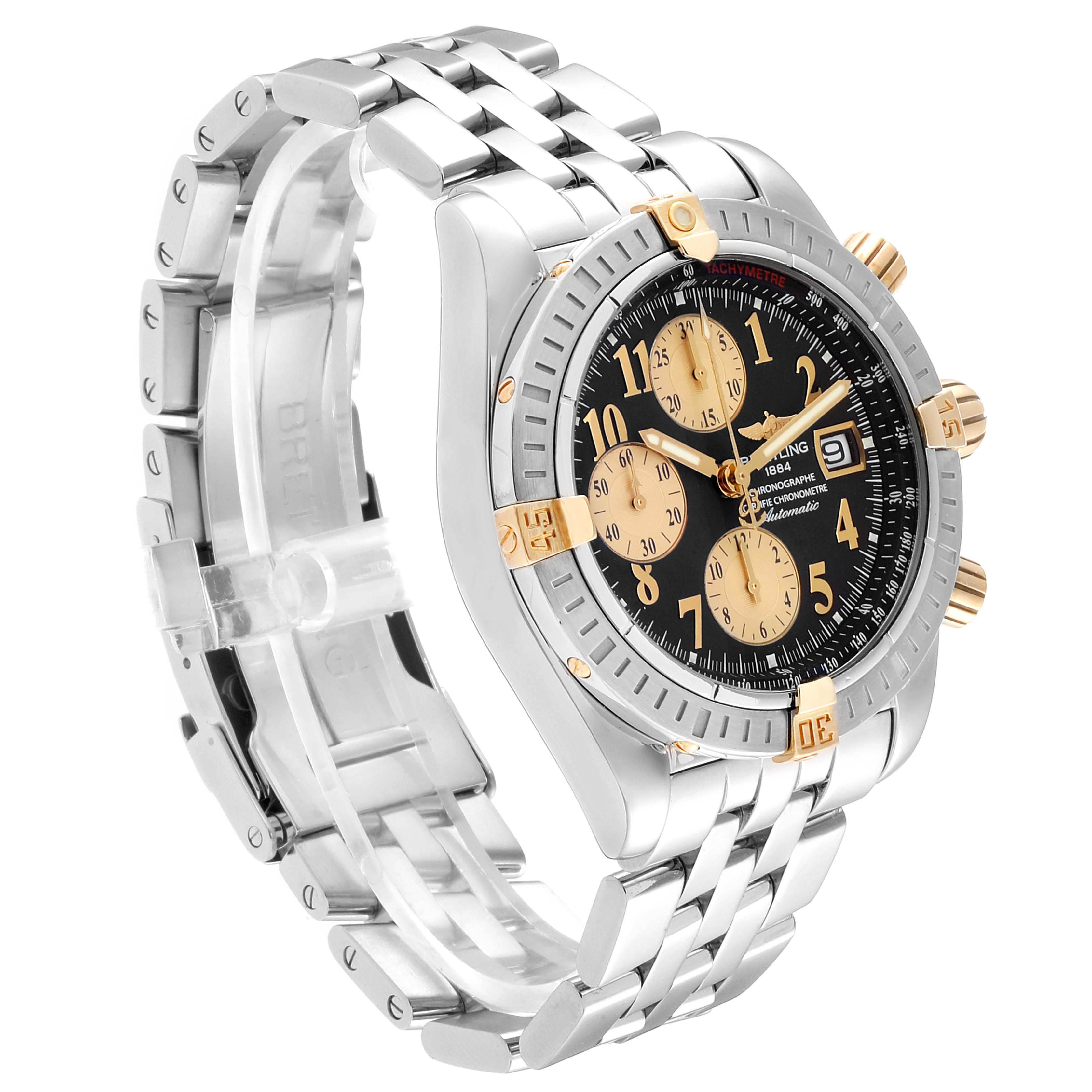 The Breitling Chronomat B13356 Men's Steel and Gold (two tone) Black Dial B13356 Men's Steel and Gold (two tone) Black Dial watch is shown at a 3/4 angle, highlighting the bezel, crown, dial, and metal bracelet.
