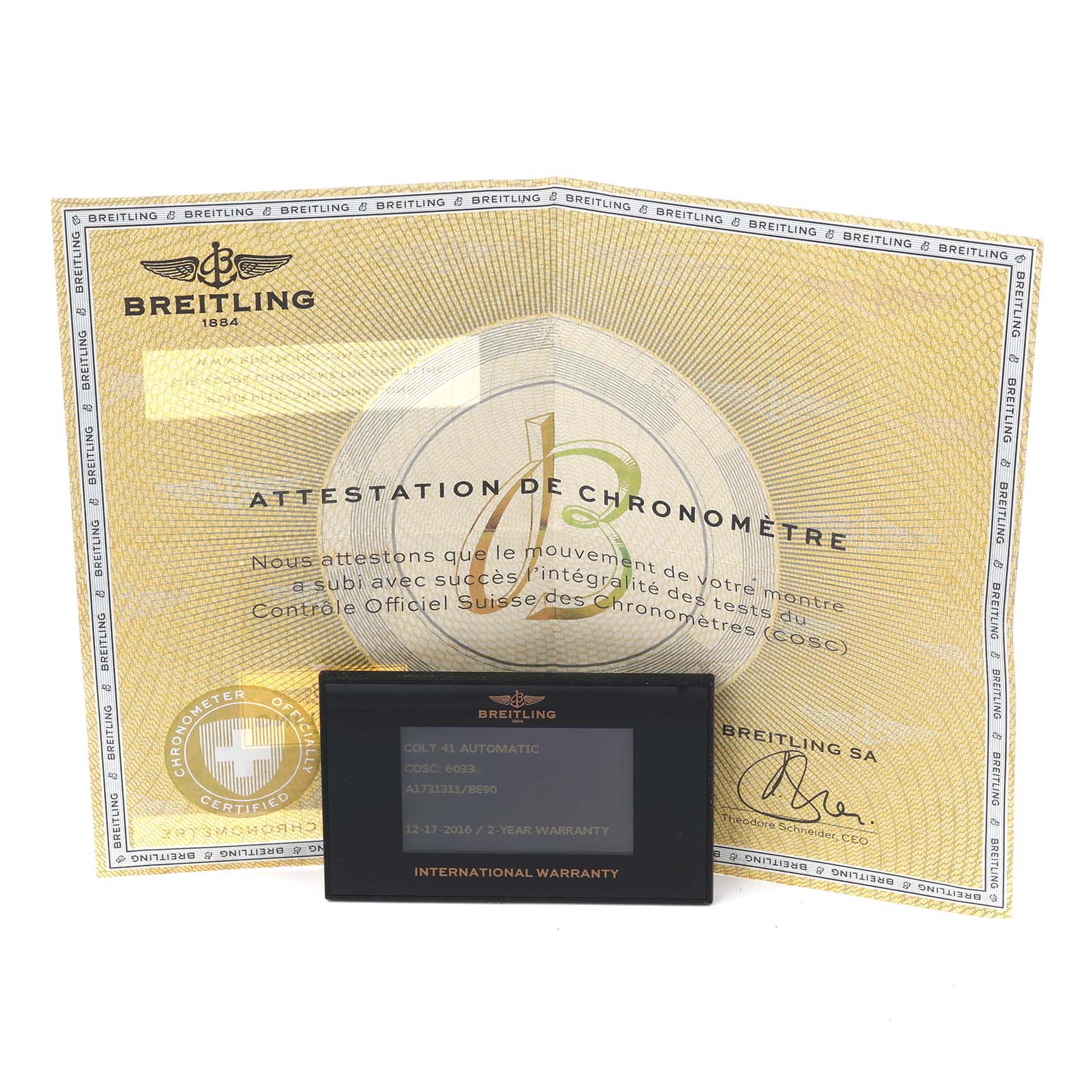 The image shows a Breitling Colt A17313 Men's Stainless Steel Black Dial A17313 Men's Stainless Steel Black Dial warranty card and certificate at a slightly elevated angle.