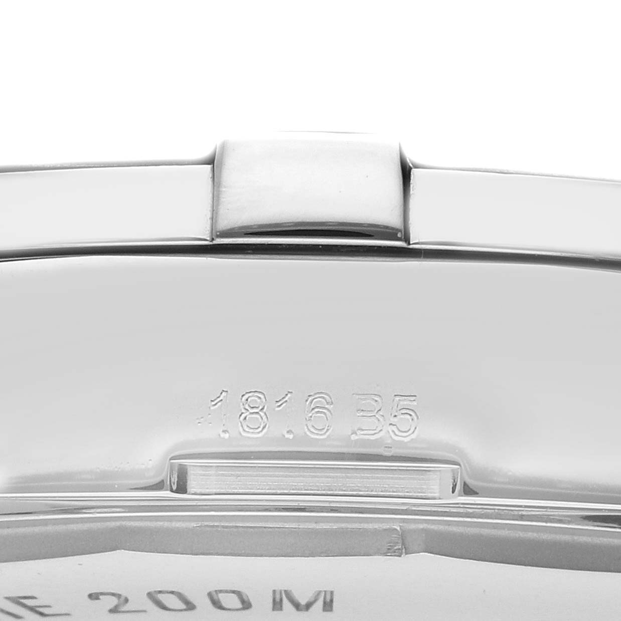 The image shows a close-up of the back case and part of the bracelet of the Breitling Colt A17313 Men's Stainless Steel Black Dial A17313 Men's Stainless Steel Black Dial watch, featuring engravings.