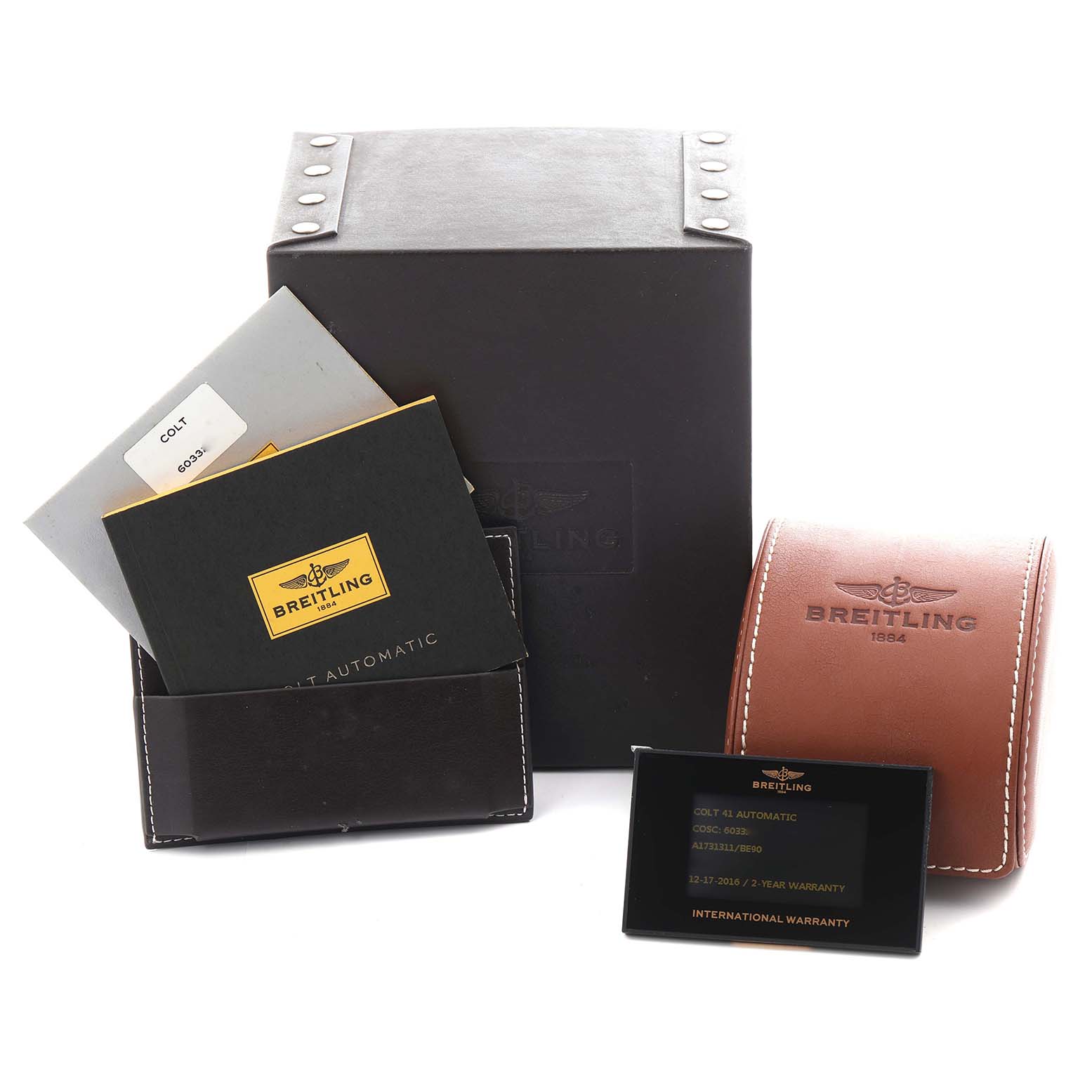 The image shows a Breitling Colt A17313 Men's Stainless Steel Black Dial A17313 Men's Stainless Steel Black Dial watch box, manuals, warranty card, and leather pouch, viewed from a front angle.