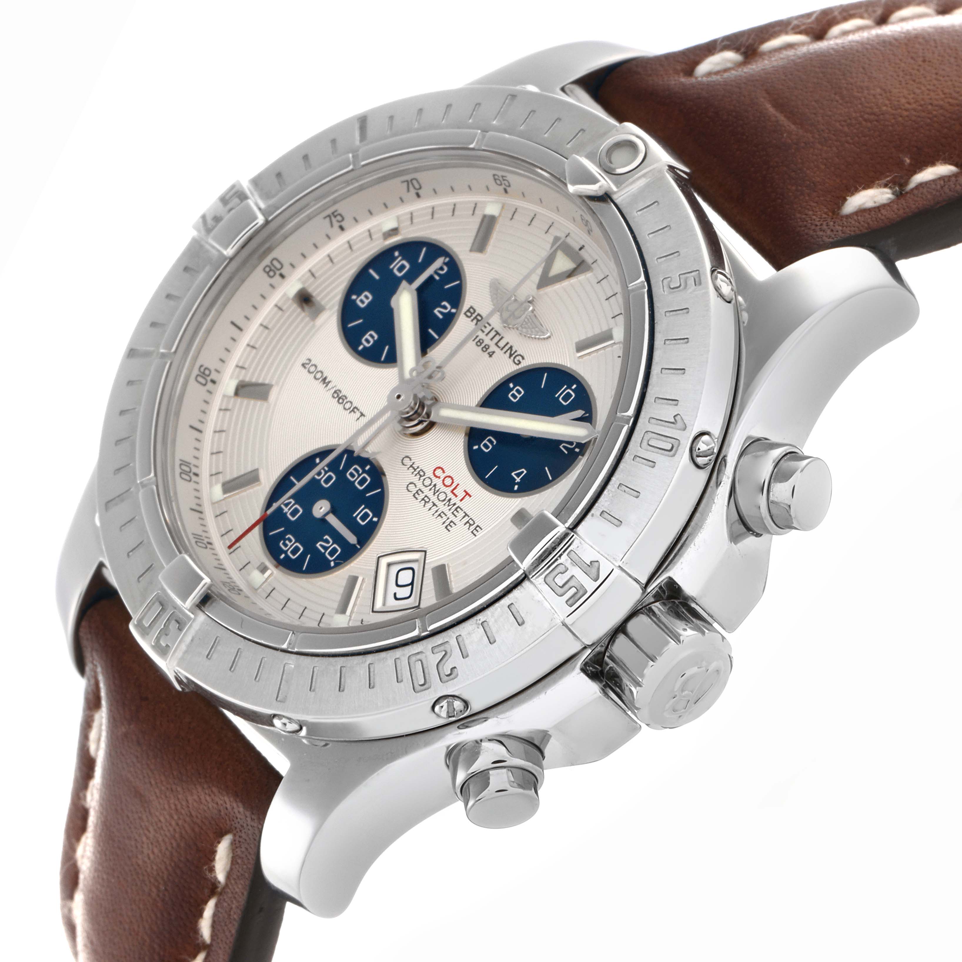 The Breitling Colt A73380 Men's Stainless Steel Silver Dial A73380 Men's Stainless Steel Silver Dial watch is shown at a slight side angle, highlighting the dial, bezel, crown, and brown leather strap.