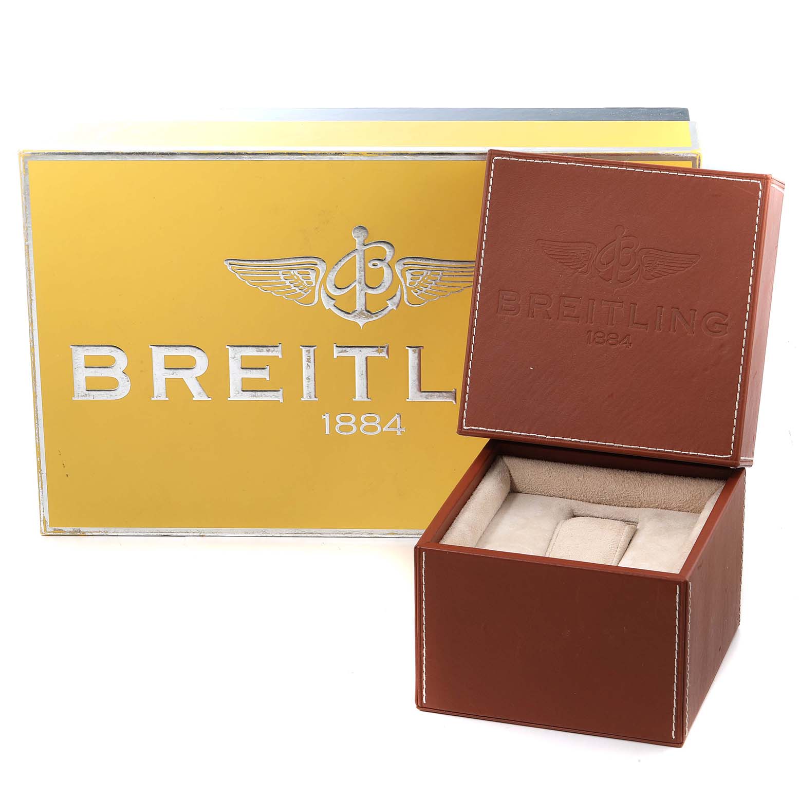The image shows a Breitling Navitimer RB0120 Men's Rose Gold Black Dial RB0120 Men's Rose Gold Black Dial watch box with an open brown leather inner case and a yellow and silver outer box.