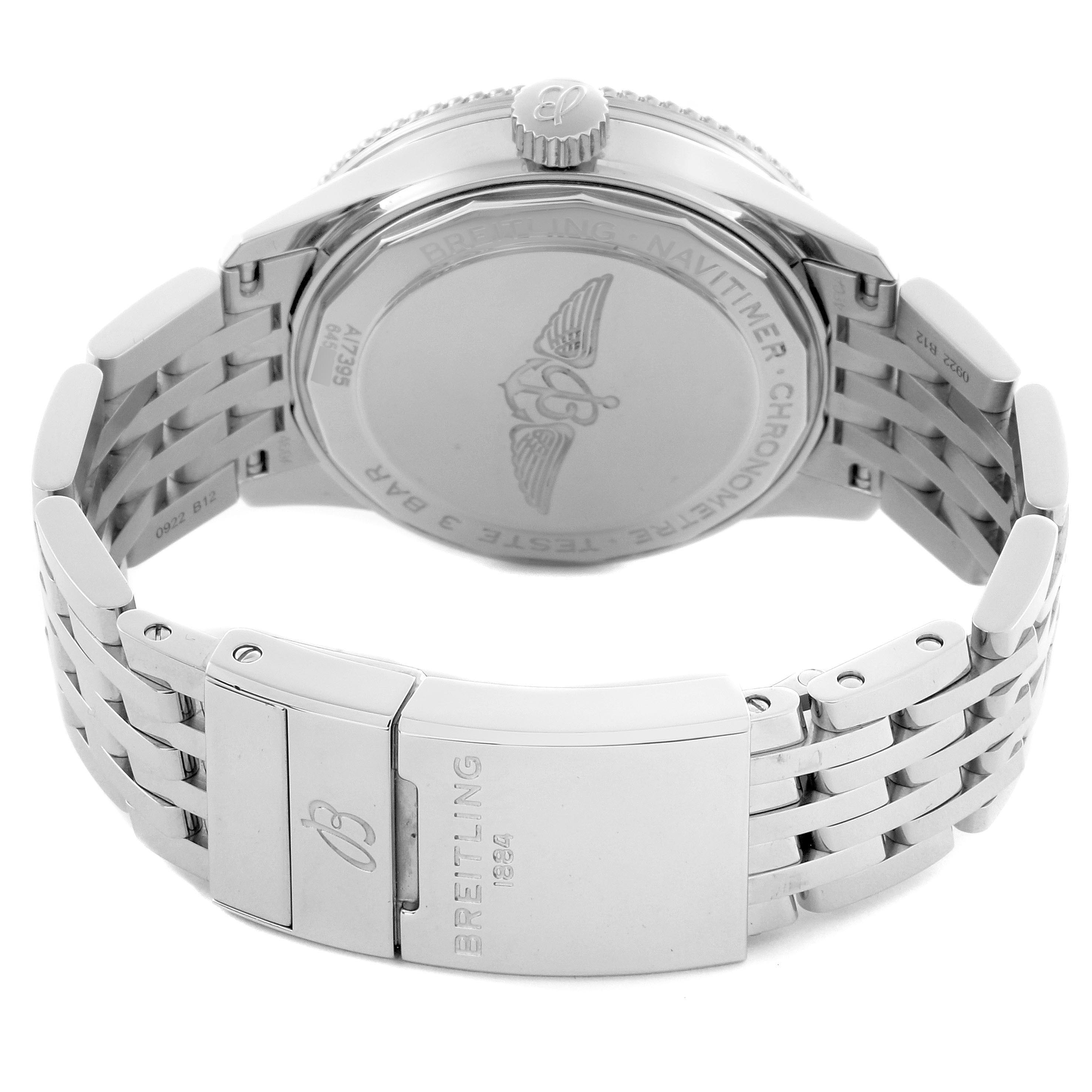 The image shows the back of a Breitling Navitimer A17395 Men's Stainless Steel Pink Dial A17395 Men's Stainless Steel Pink Dial watch, highlighting its steel bracelet and engraved case back.