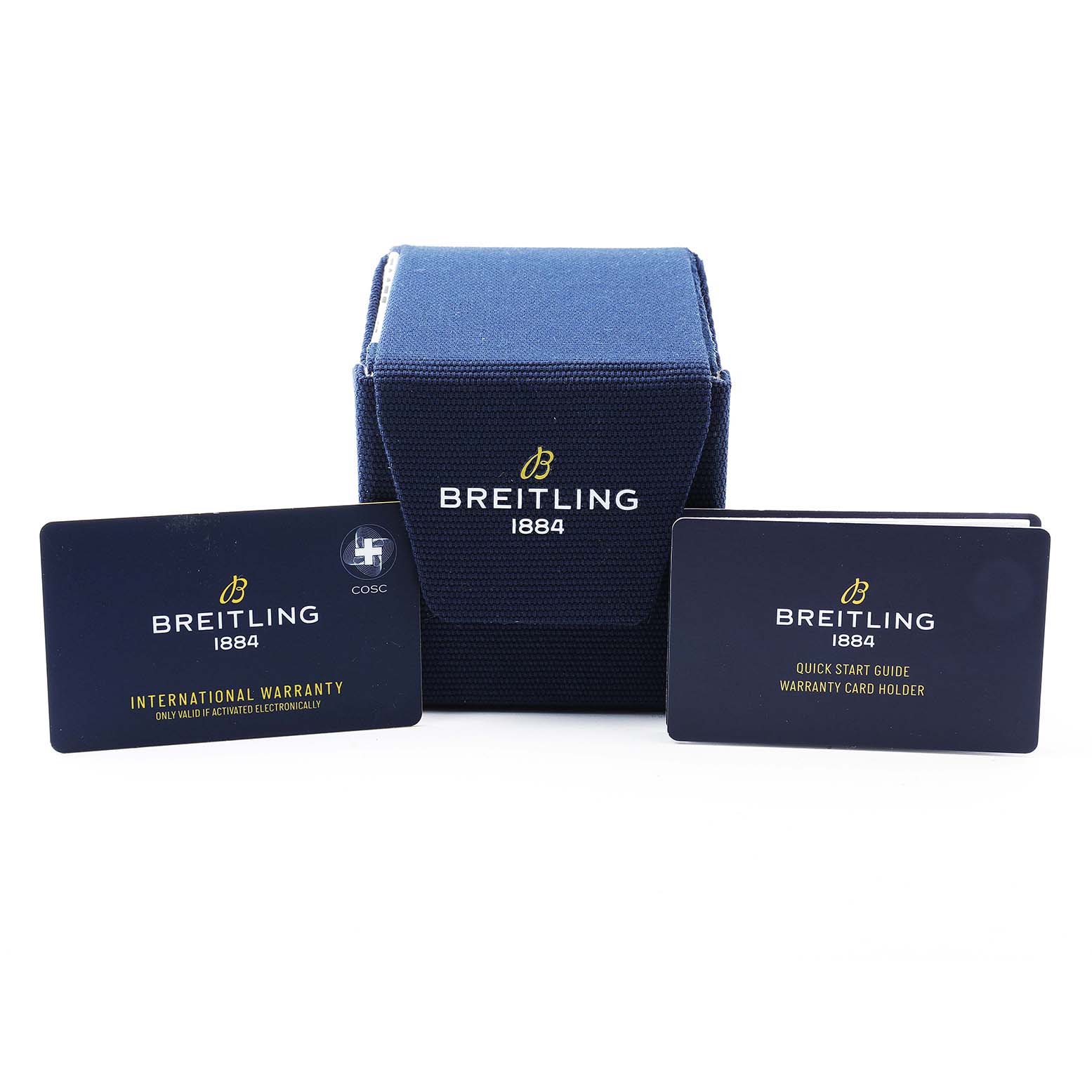 The image shows a Breitling Superocean M17368 Men's Stainless Steel Blue Dial box, international warranty card, and a quick start guide card, all arranged front-facing.