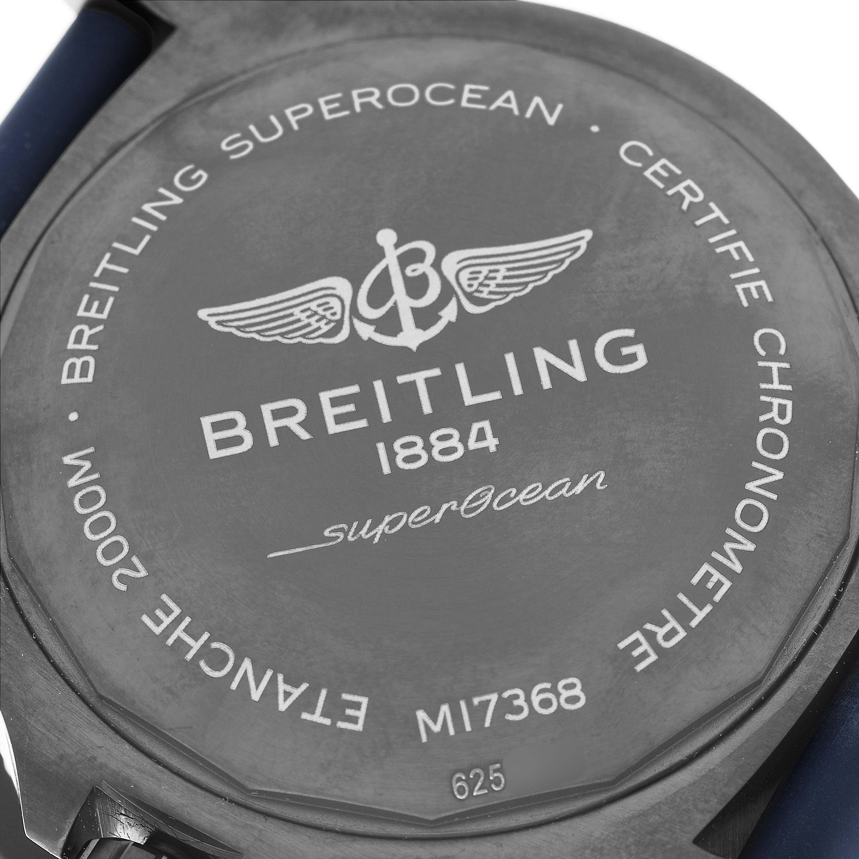 The image shows the back case of a Breitling Superocean M17368 Men's Stainless Steel Blue Dial watch, highlighting brand engravings and model details.