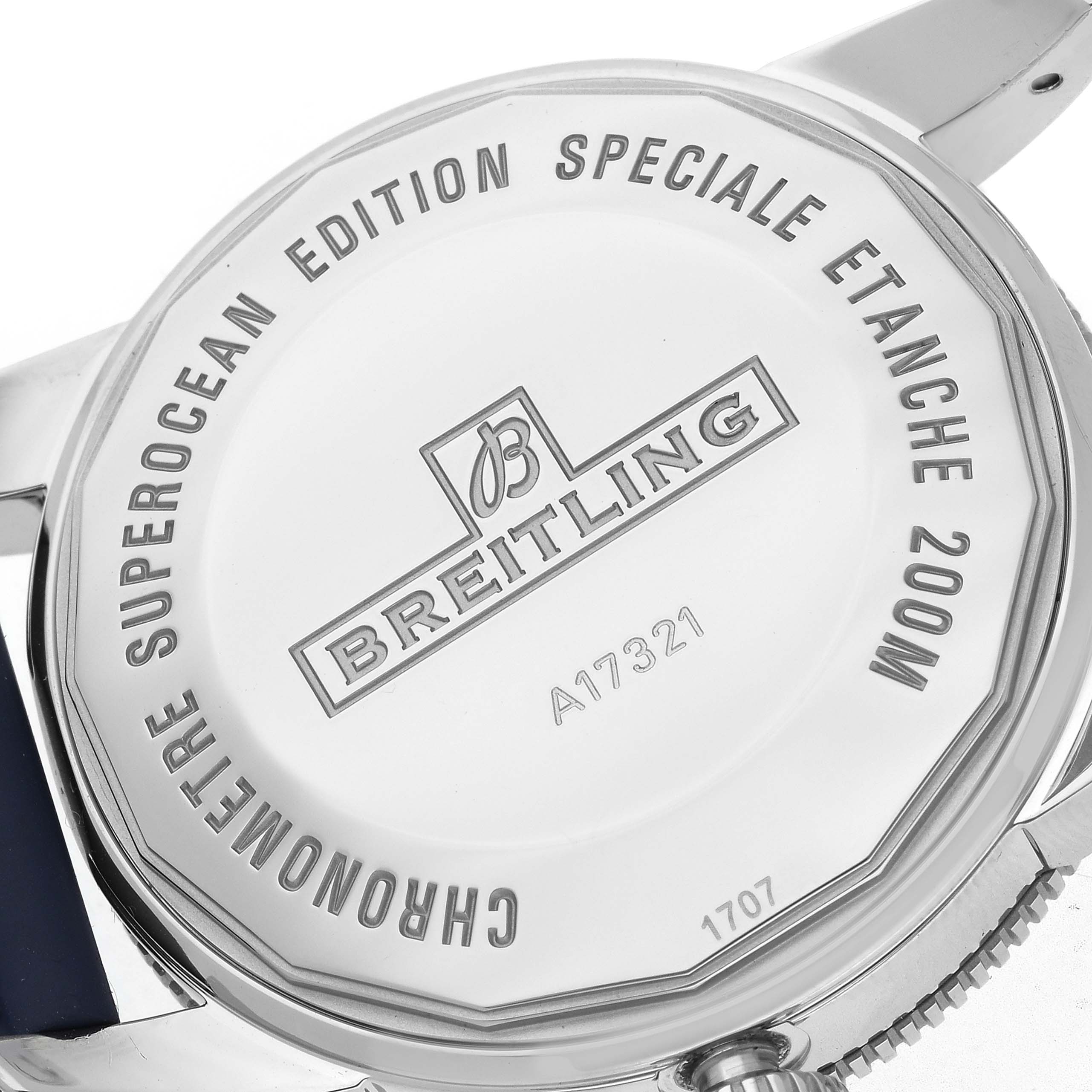 The image shows the back of the Breitling Superocean A17321 Men's Stainless Steel Silver Dial A17321 Men's Stainless Steel Silver Dial watch, displaying branding and specifications.