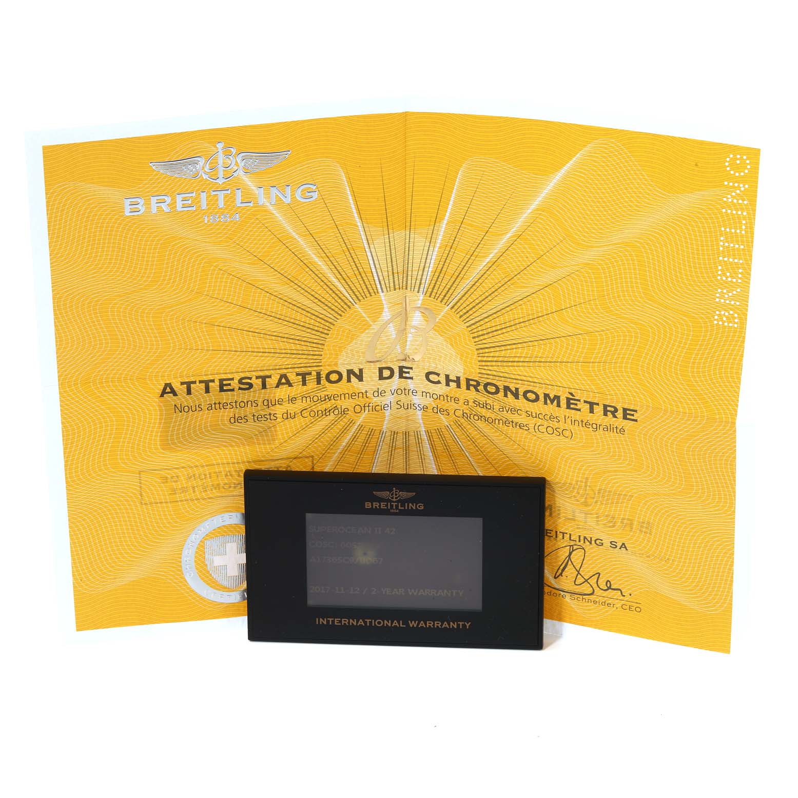 This image features the Breitling Superocean A17365 Men's Stainless Steel Black Dial A17365 Men's Stainless Steel Black Dial's Attestation de Chronomètre certificate and the International Warranty card.