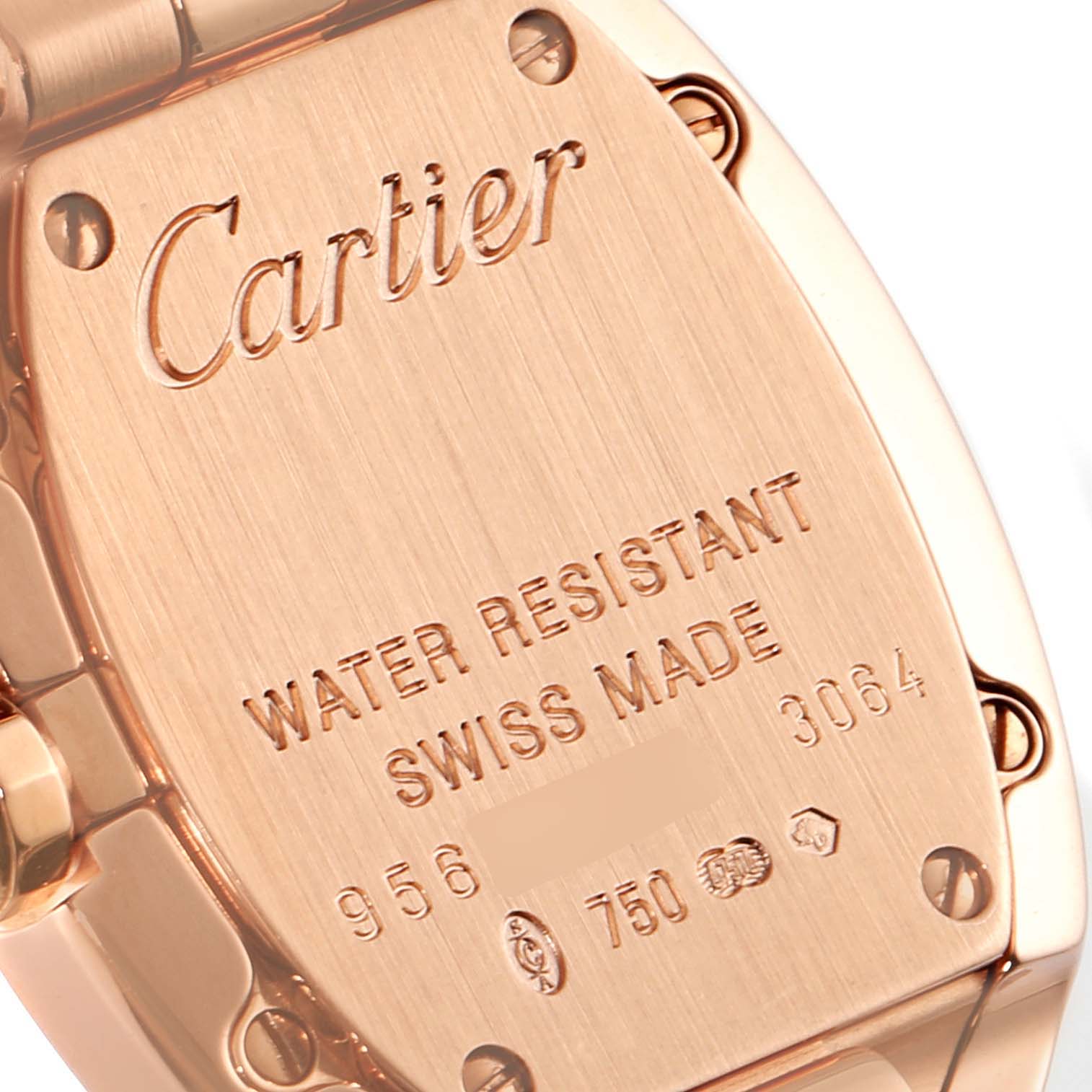 The image shows the back case of a Cartier Baignoire WB520002 Women's Rose Gold Silver Dial WB520002 Women's Rose Gold Silver Dial watch, highlighting the engraved brand name and specifications.