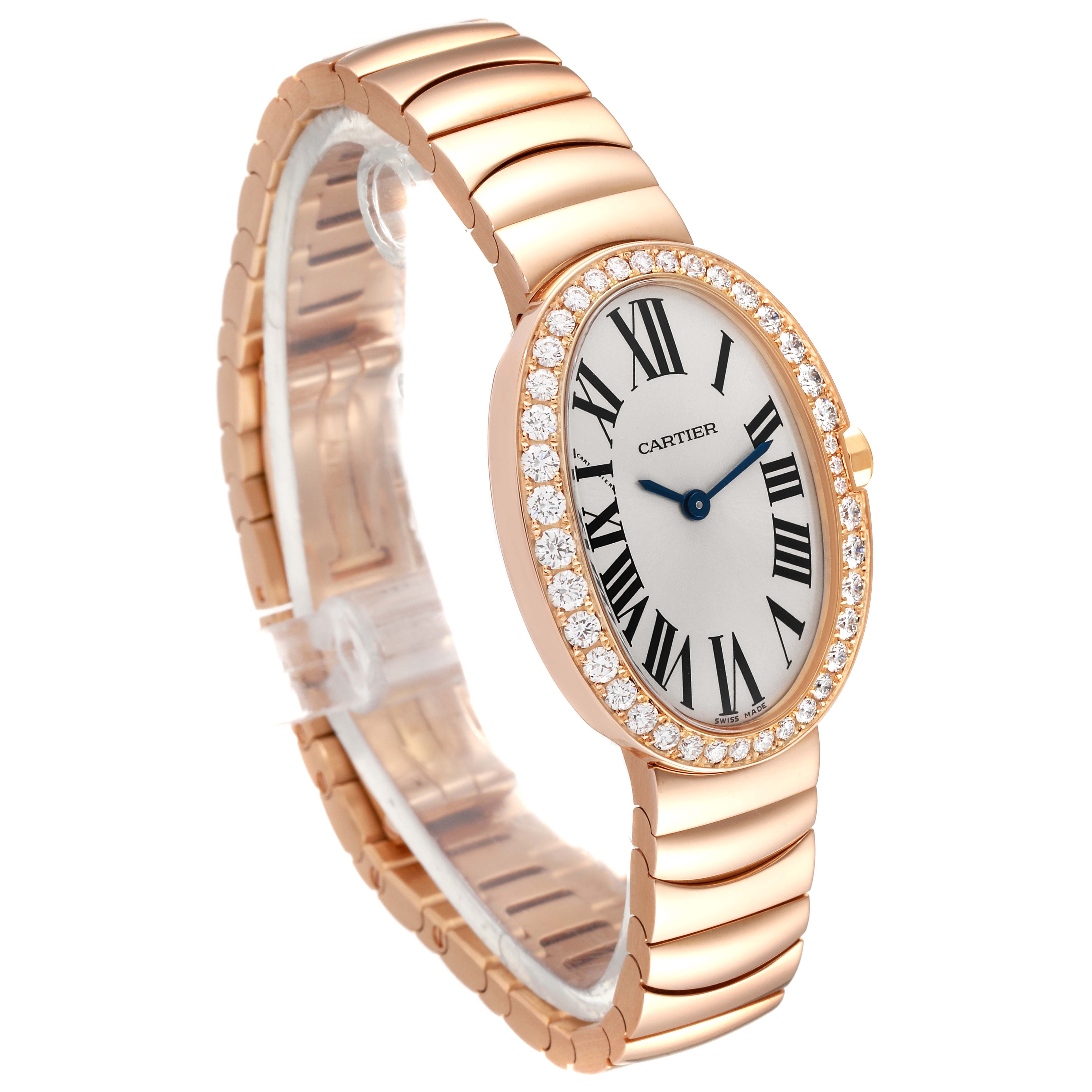 The image shows a Cartier Baignoire WB520002 Women's Rose Gold Silver Dial WB520002 Women's Rose Gold Silver Dial watch angled to display its face, diamond-studded bezel, and rose gold bracelet.