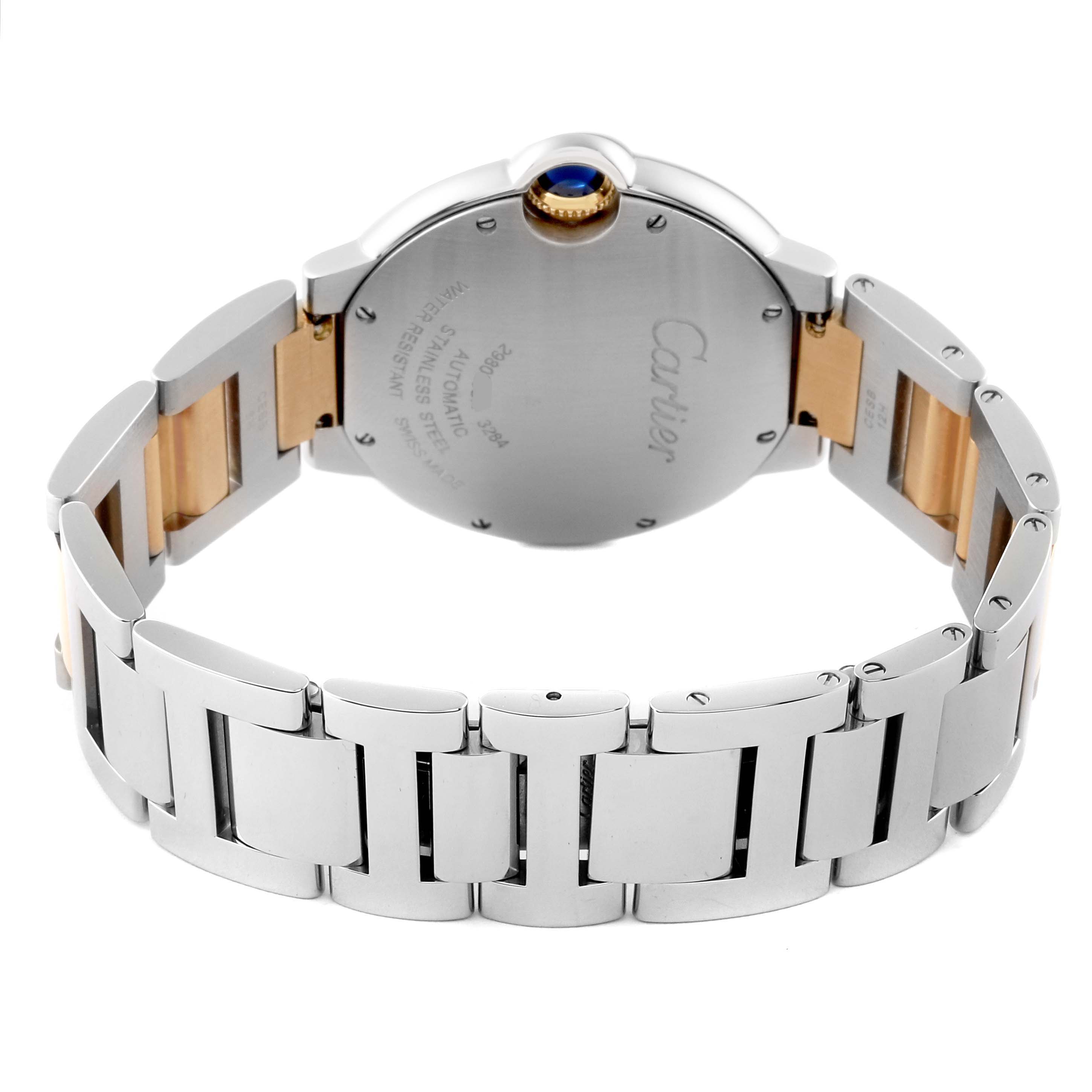 The image shows the back view of a Cartier Ballon Bleu W6920047 Women's Steel and Gold (two tone) Silver Dial W6920047 Women's Steel and Gold (two tone) Silver Dial watch, focusing on the case back and metal bracelet.