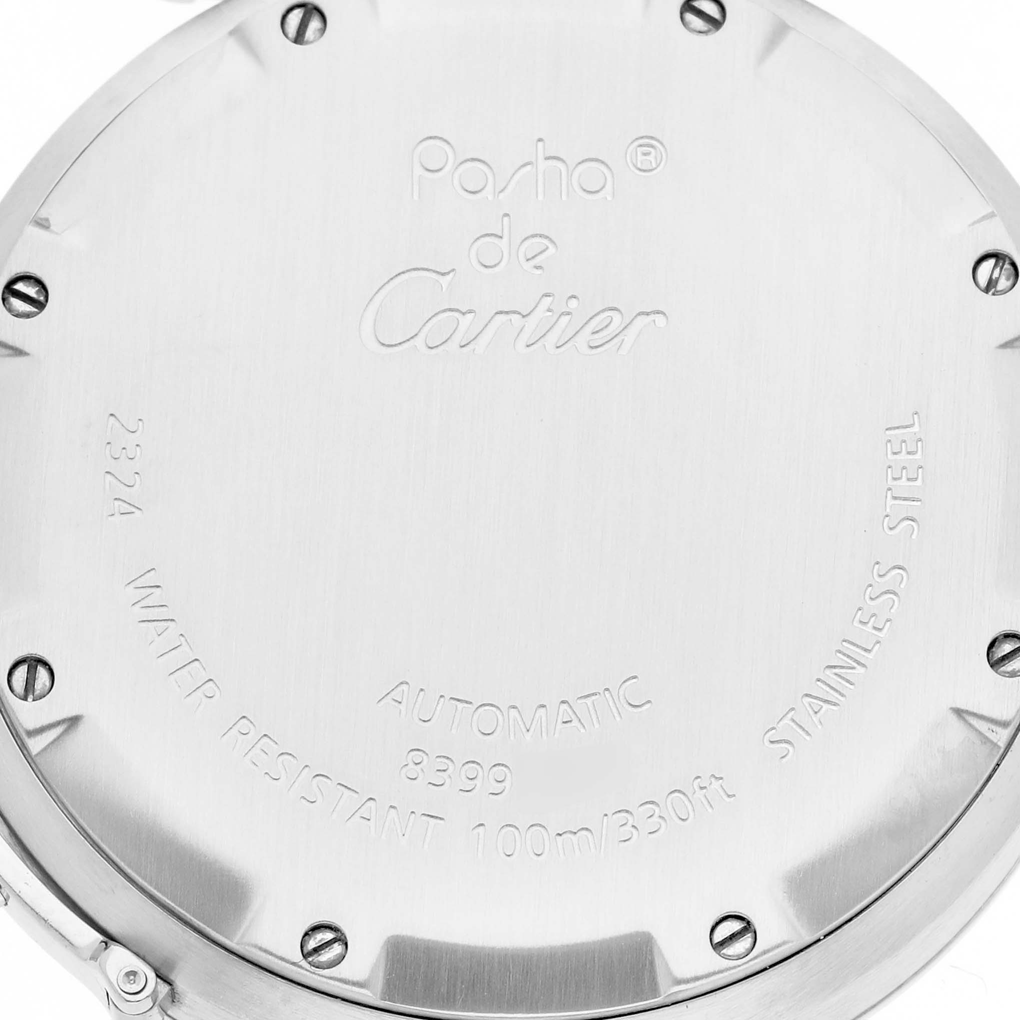This image shows the back case of a Cartier Pasha W31075M7 Women's Stainless Steel Pink Dial W31075M7 Women's Stainless Steel Pink Dial watch, highlighting its engravings and screws.