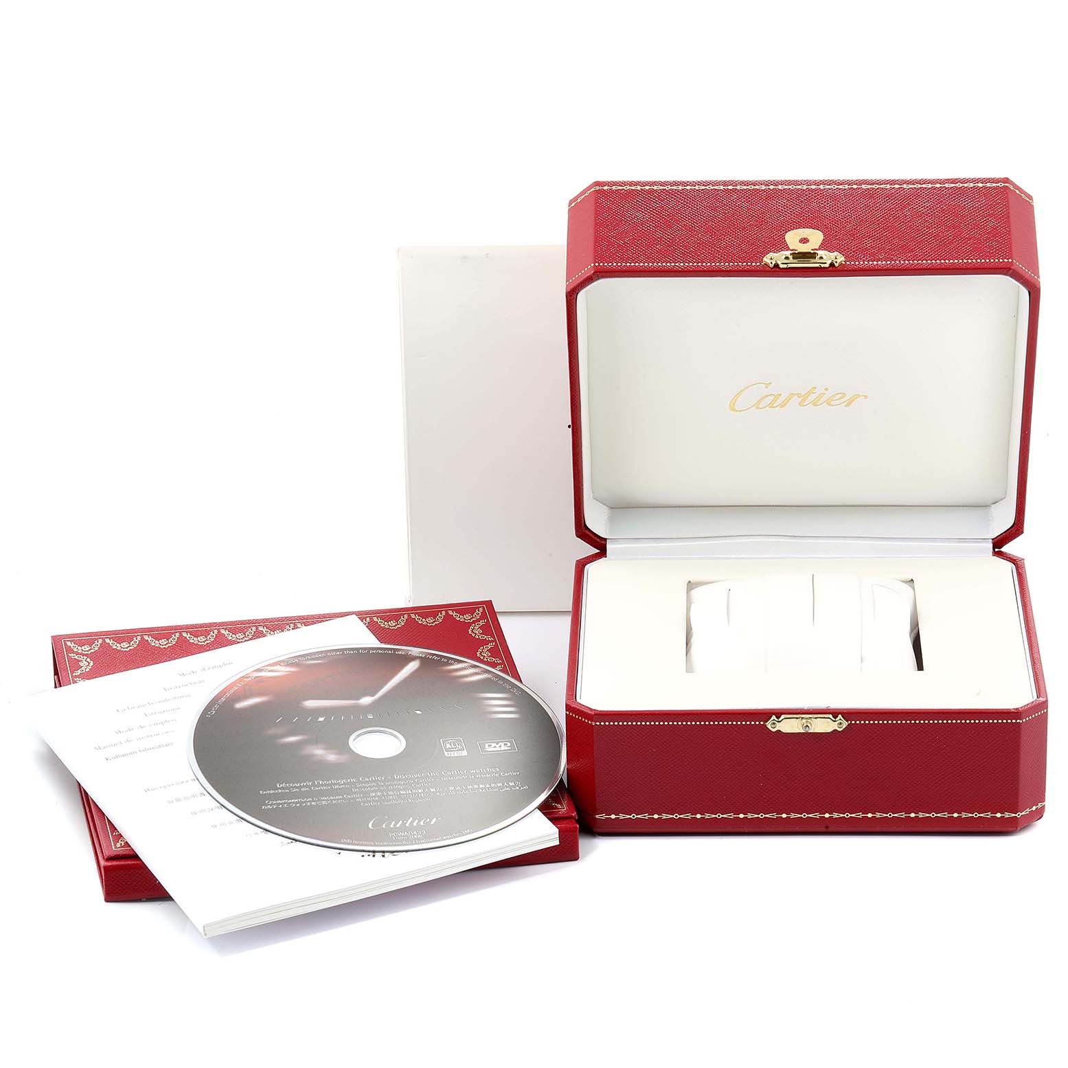 The image shows the open box, manual, and CD for a Santos model watch by Cartier.
