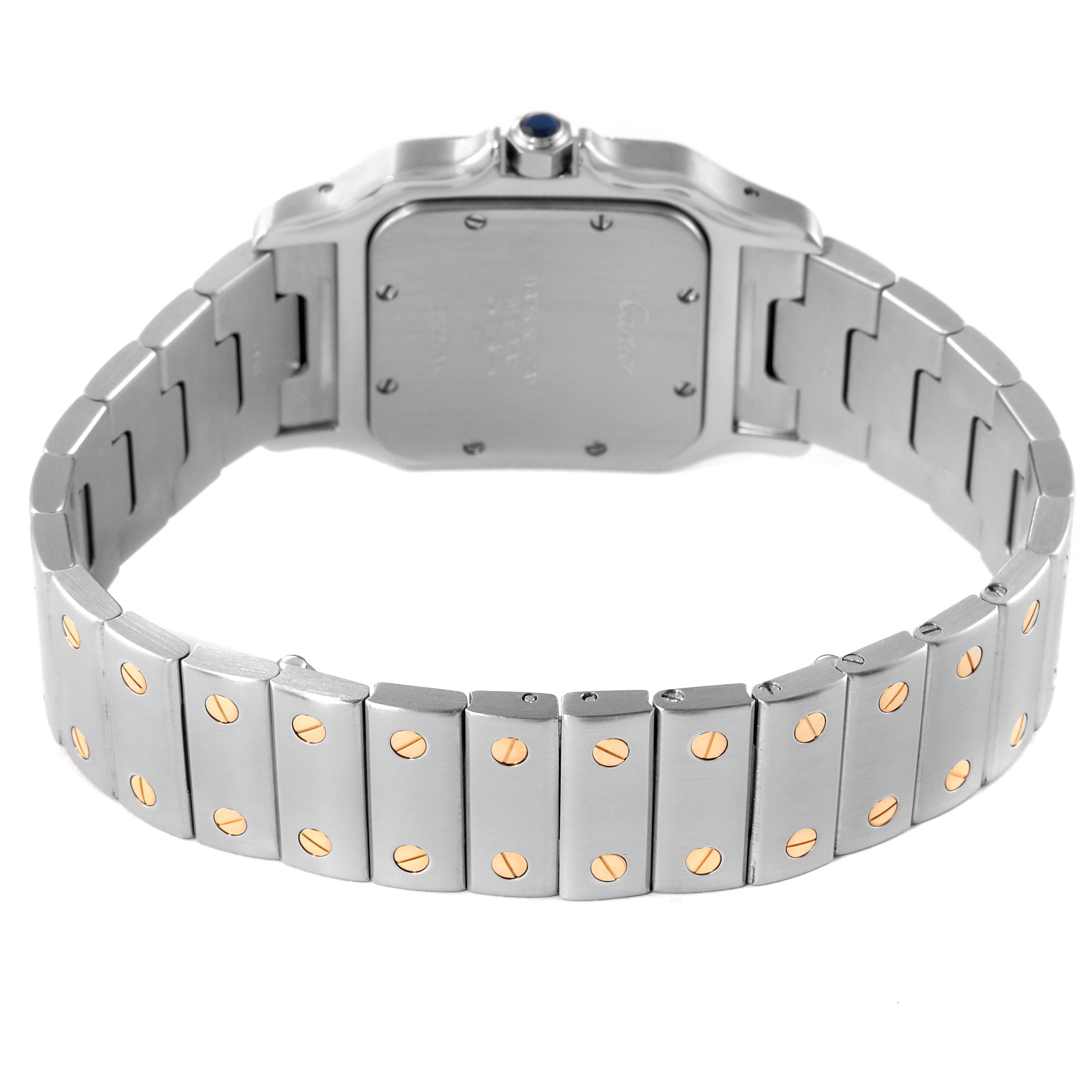 The image shows the back of the Cartier Santos 1566 Men
s Steel and Gold (two tone) Silver Dial 1566 Men
s Steel and Gold (two tone) Silver Dial watch, highlighting the case back, bracelet, and clasp.