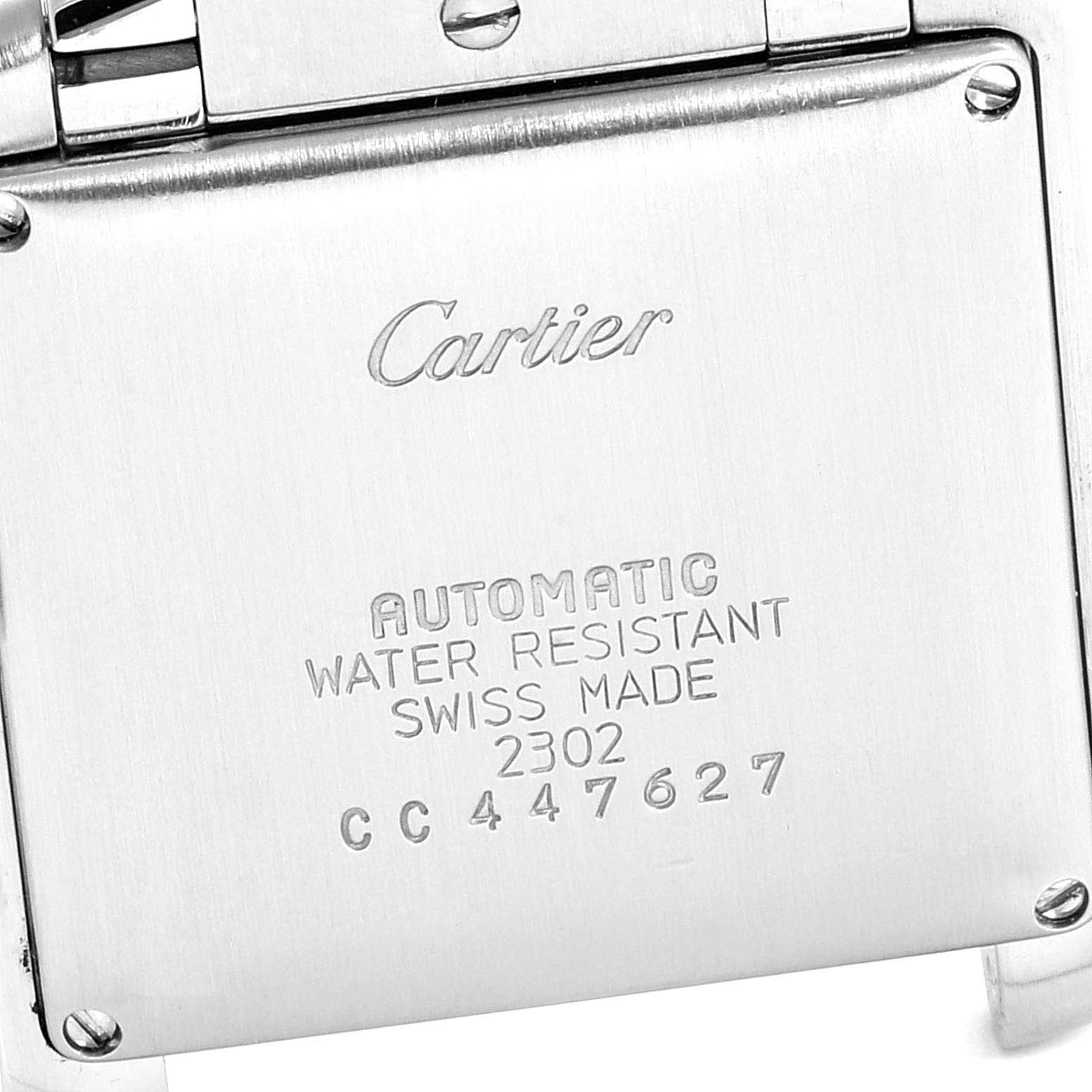 This image shows the back case of a Tank Francaise model by Cartier from a close-up angle.