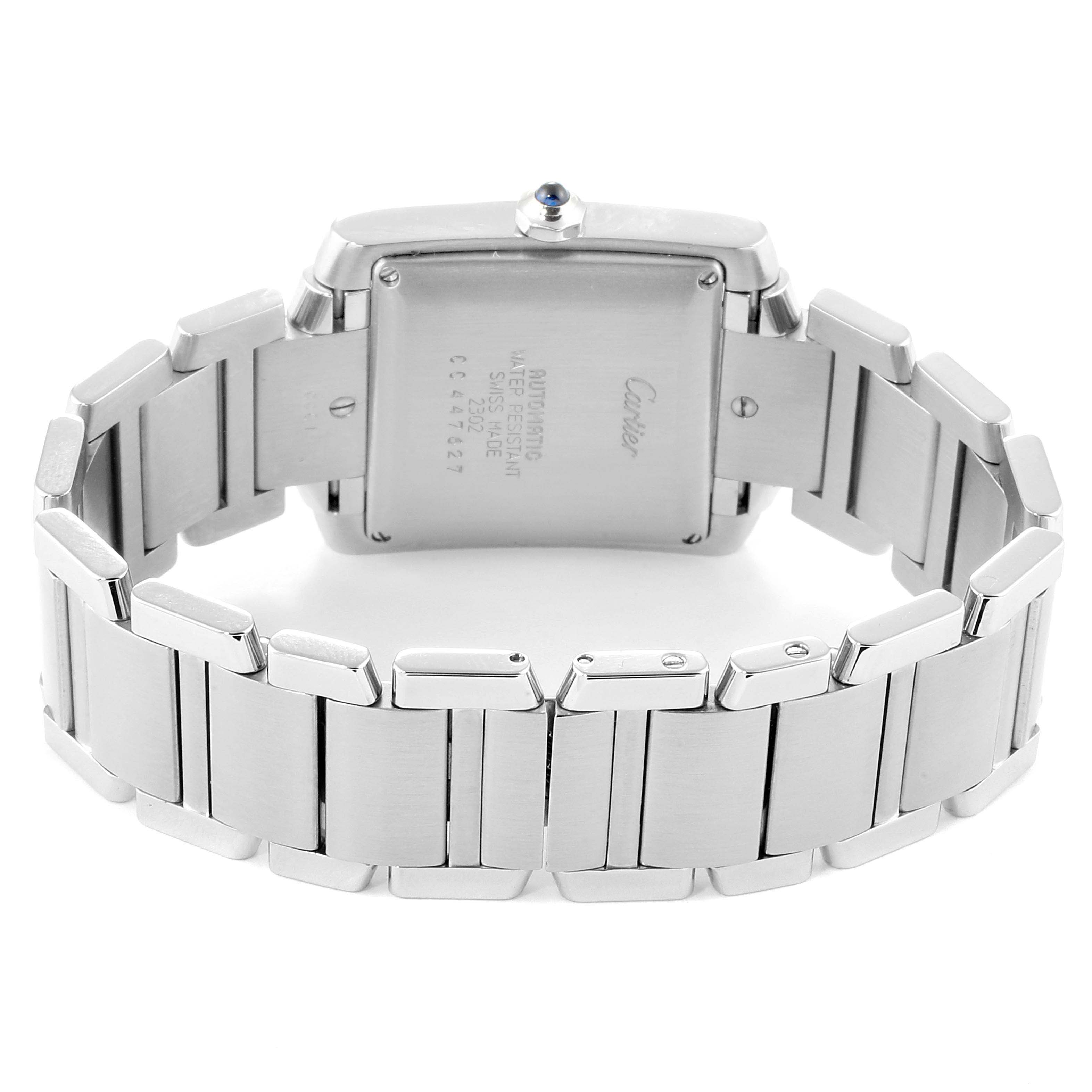 The image shows the back view of the Tank Française watch by Cartier, highlighting the bracelet and case back.