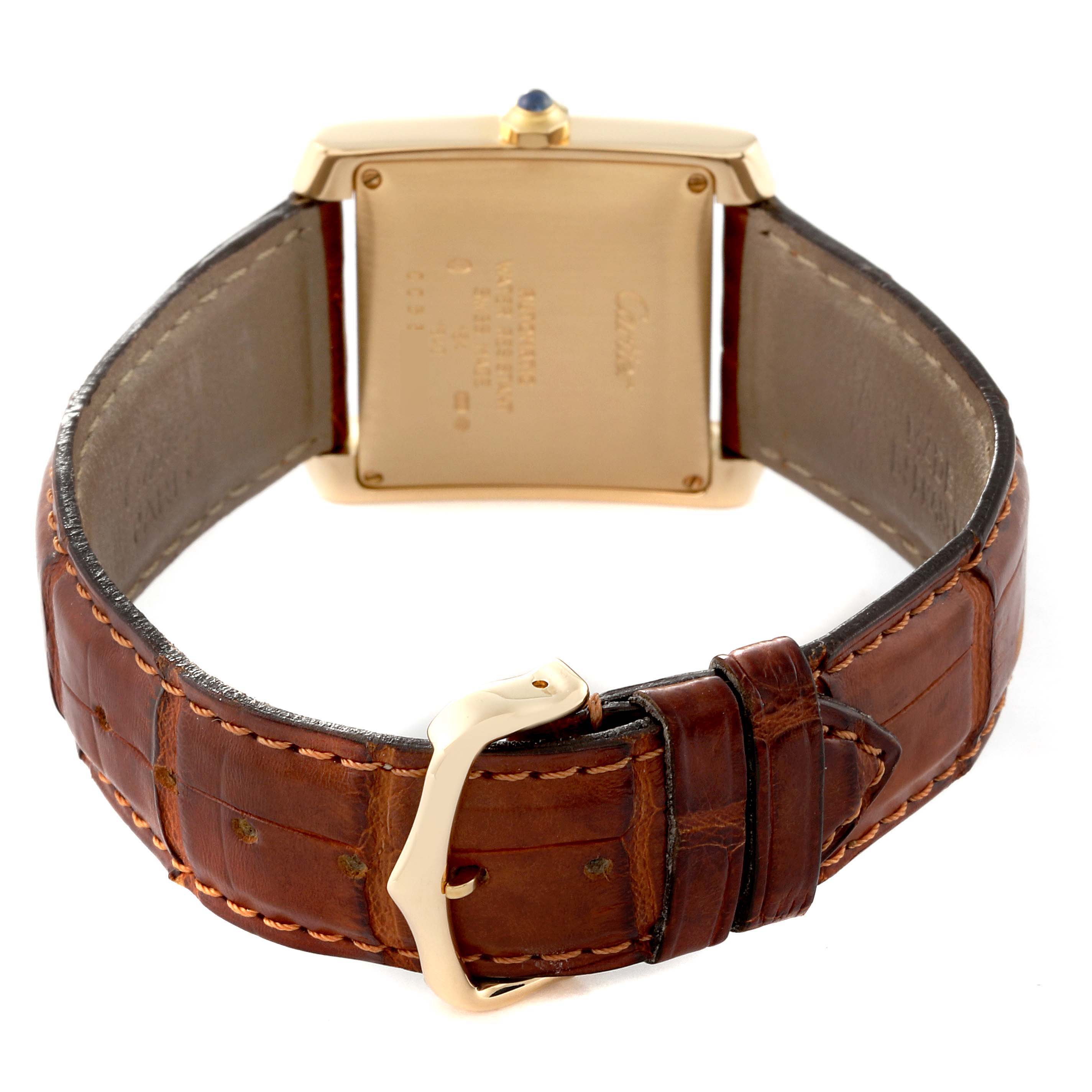 This image shows the back view of a Cartier Tank Francaise W5000156 Men
s Yellow Gold Silver Dial W5000156 Men
s Yellow Gold Silver Dial watch, highlighting its case back and leather strap with buckle.