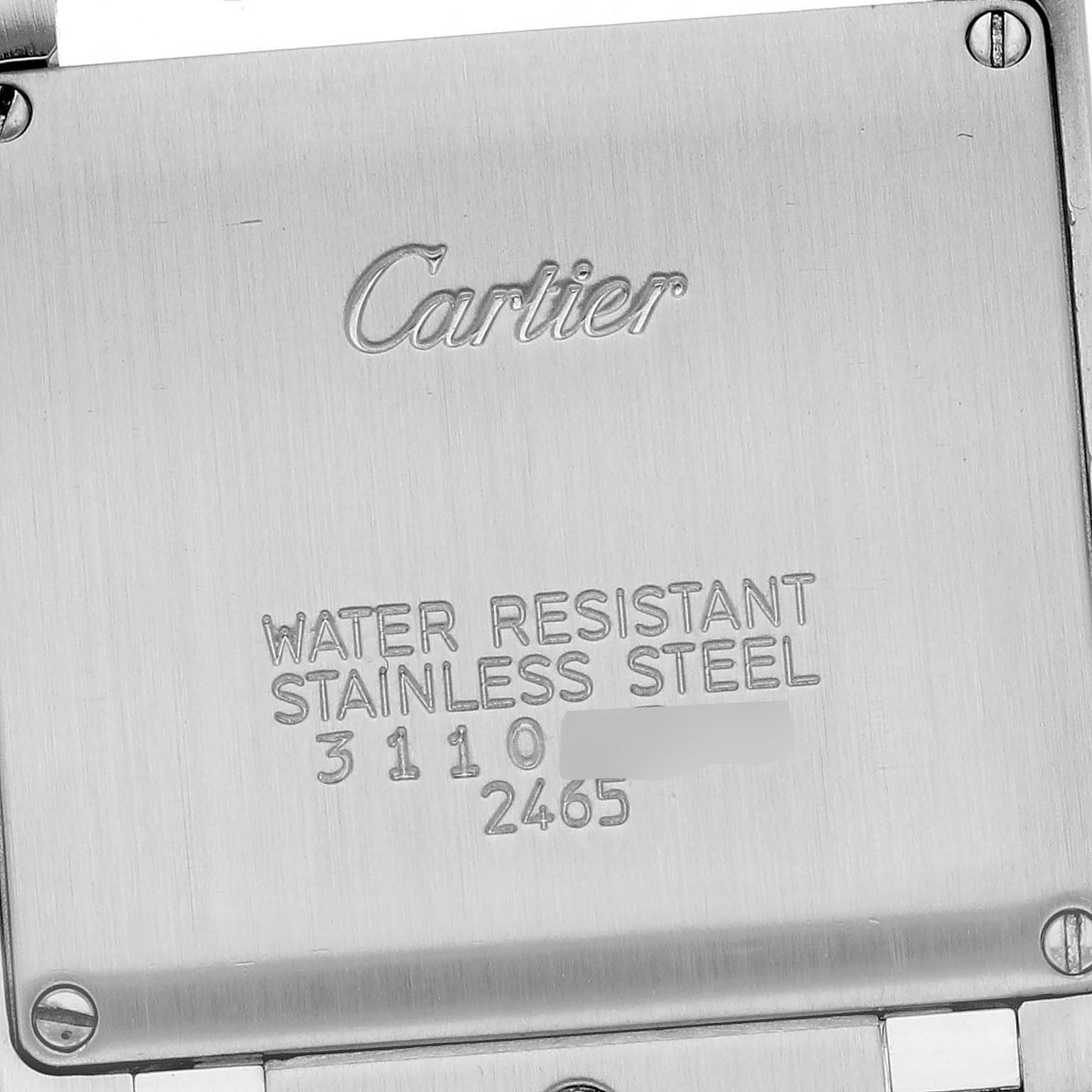 This image shows the back cover of the Cartier Tank Française watch, displaying the brand name, water resistance, material, and model numbers.