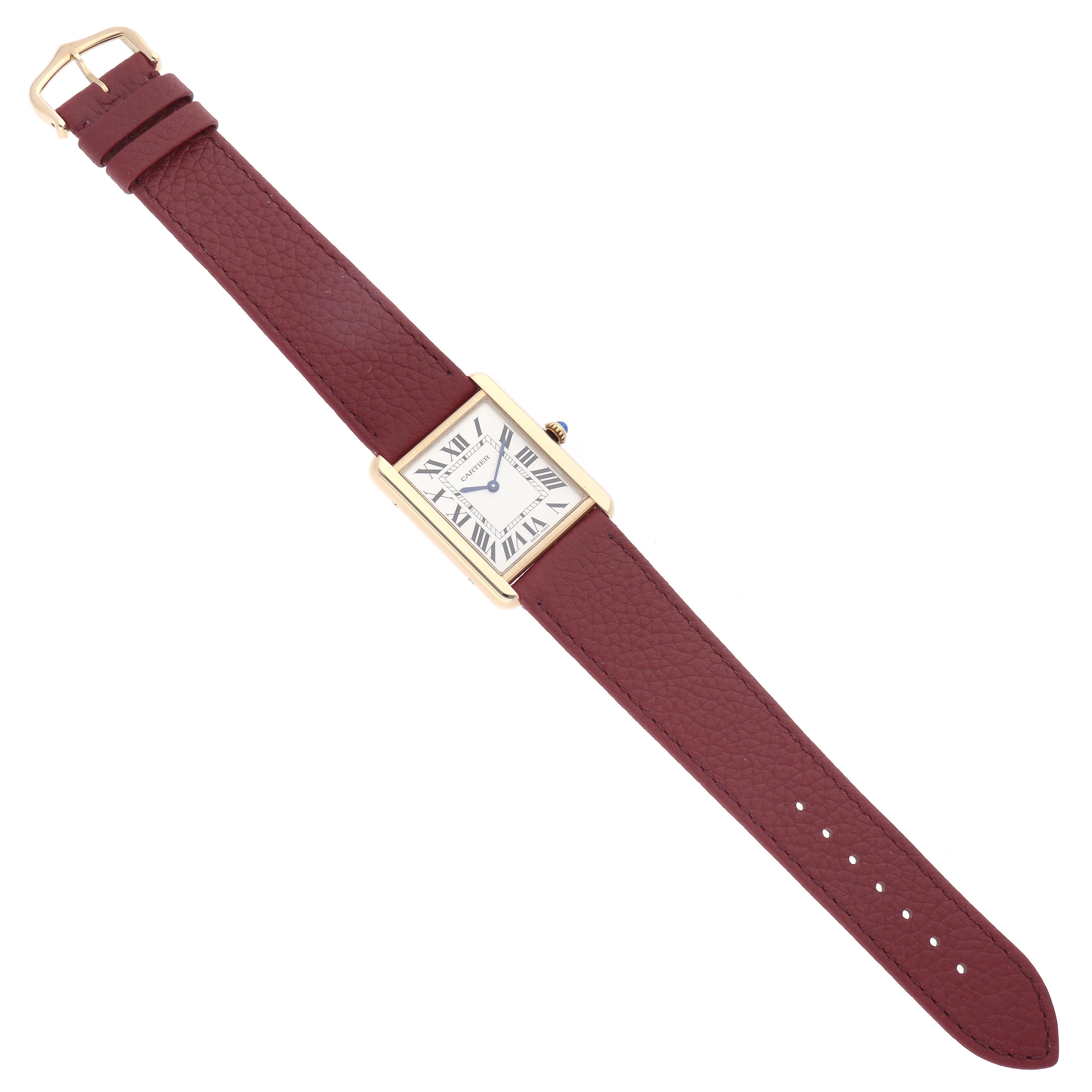 The Cartier Tank Solo W1018855 Men
s Steel and Gold (two tone) Silver Dial W1018855 Men
s Steel and Gold (two tone) Silver Dial watch is shown from an overhead angle, displaying the rectangular face, leather strap, and buckle.