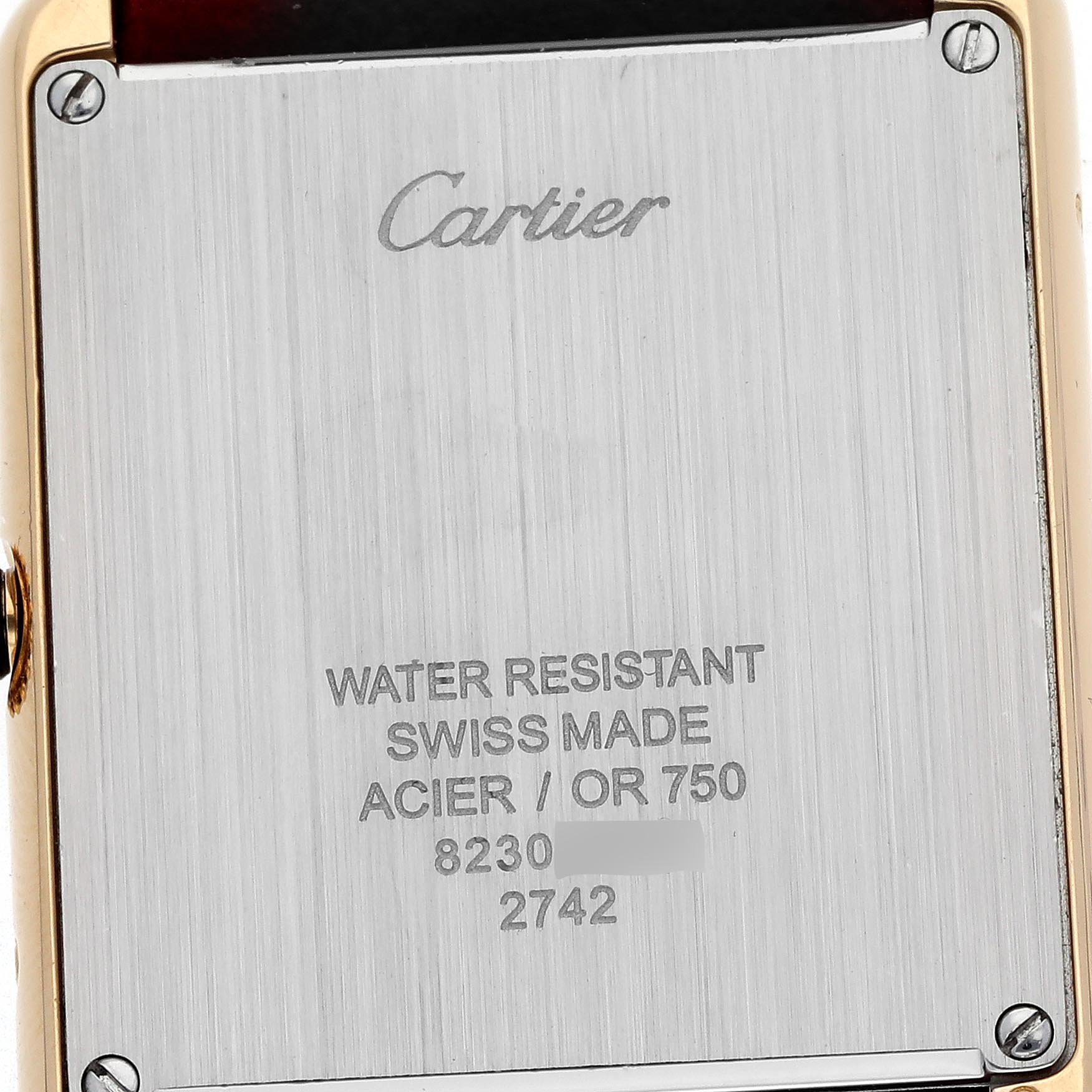 The image shows the back case of the Cartier Tank Solo W1018855 Men
s Steel and Gold (two tone) Silver Dial W1018855 Men
s Steel and Gold (two tone) Silver Dial watch, detailing its water resistance and material specifications.