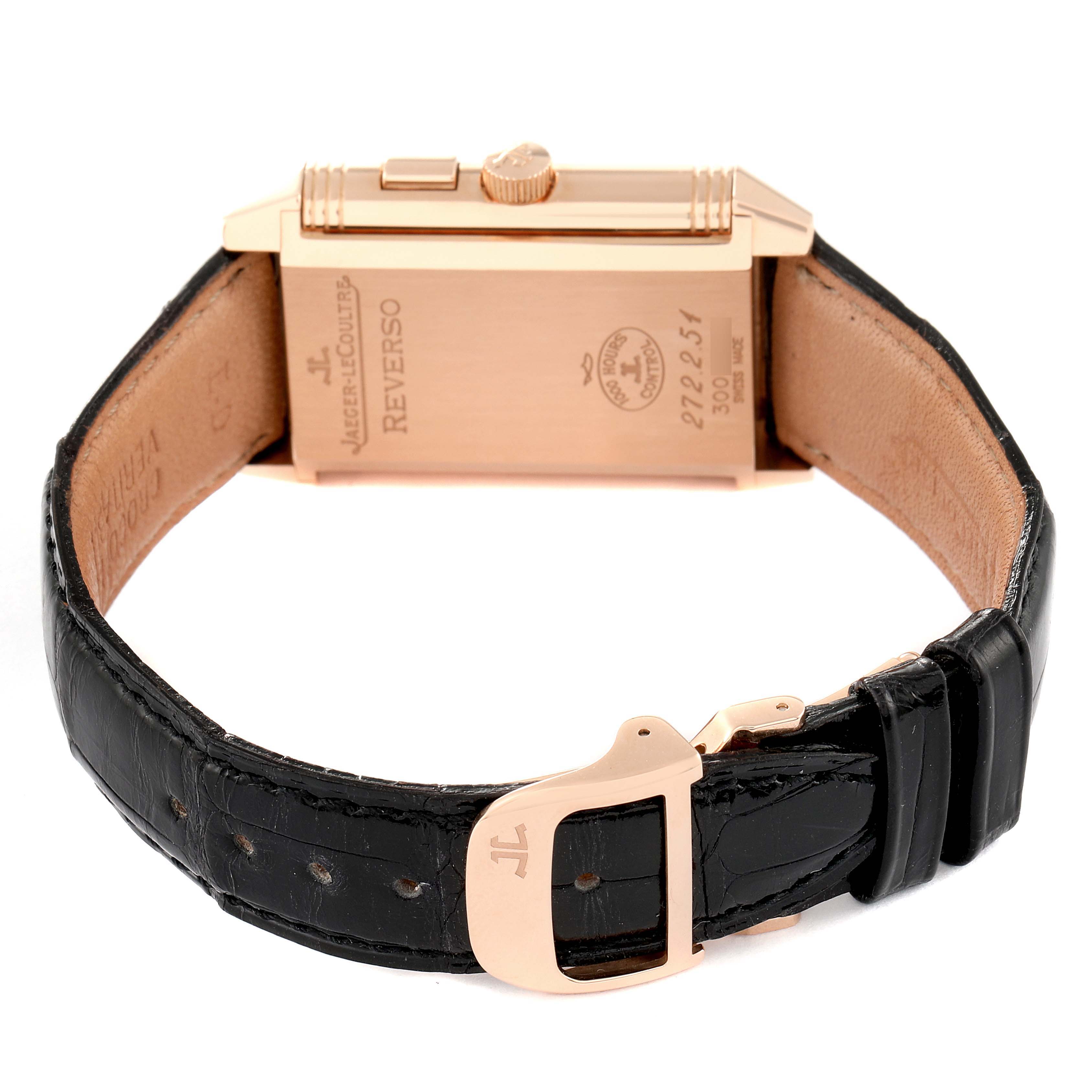The image shows the back and strap of a Jaeger LeCoultre Reverso 272.2.54 Men's Rose Gold Silver Dial 272.2.54 Men's Rose Gold Silver Dial watch, featuring a leather band and a gold case back.