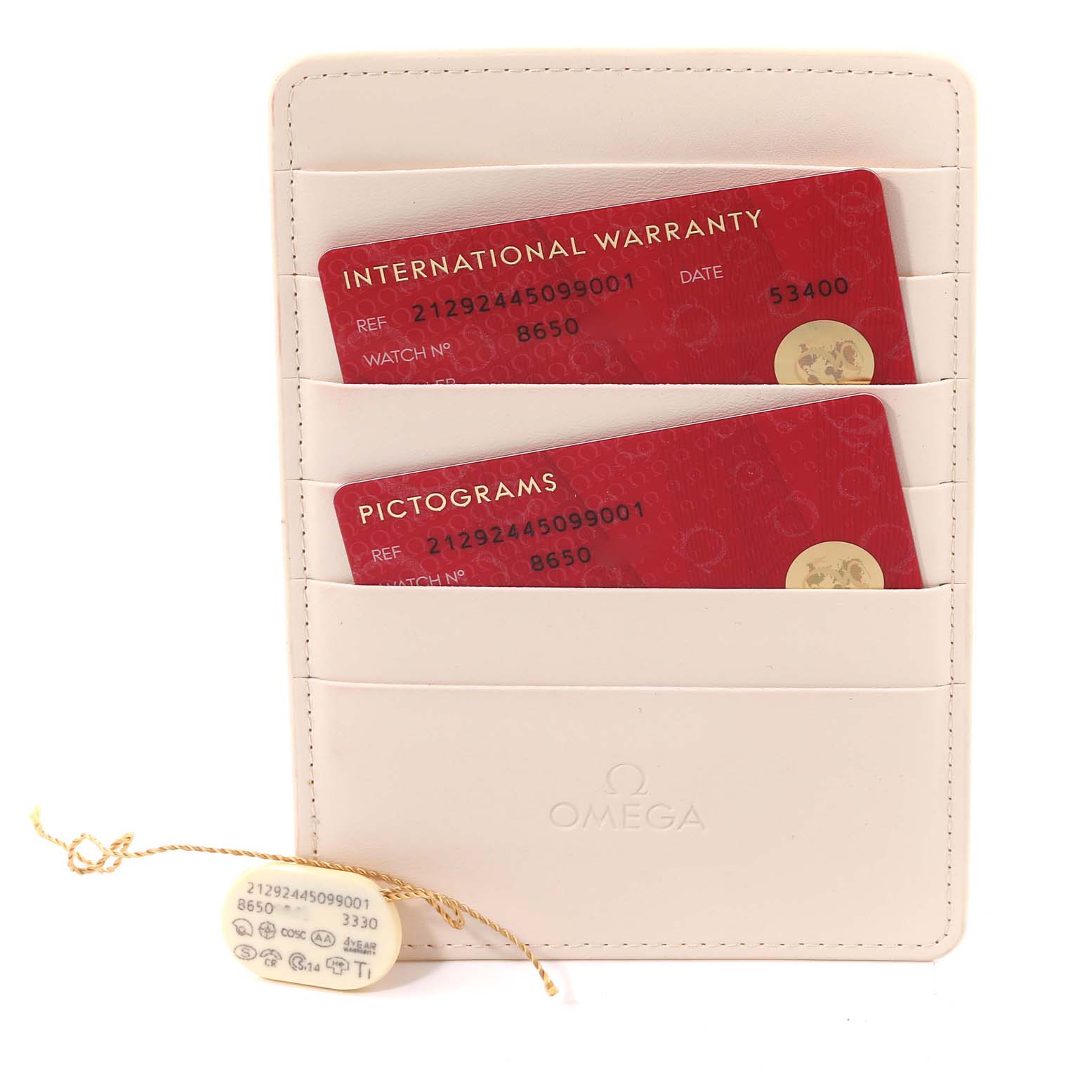 The image shows Omega Seamaster 212.92.44.50.99.001 Men
s Titanium Grey Dial 212.92.44.50.99.001 Men
s Titanium Grey Dial model warranty and pictogram cards in a white cardholder, with a tag attached.