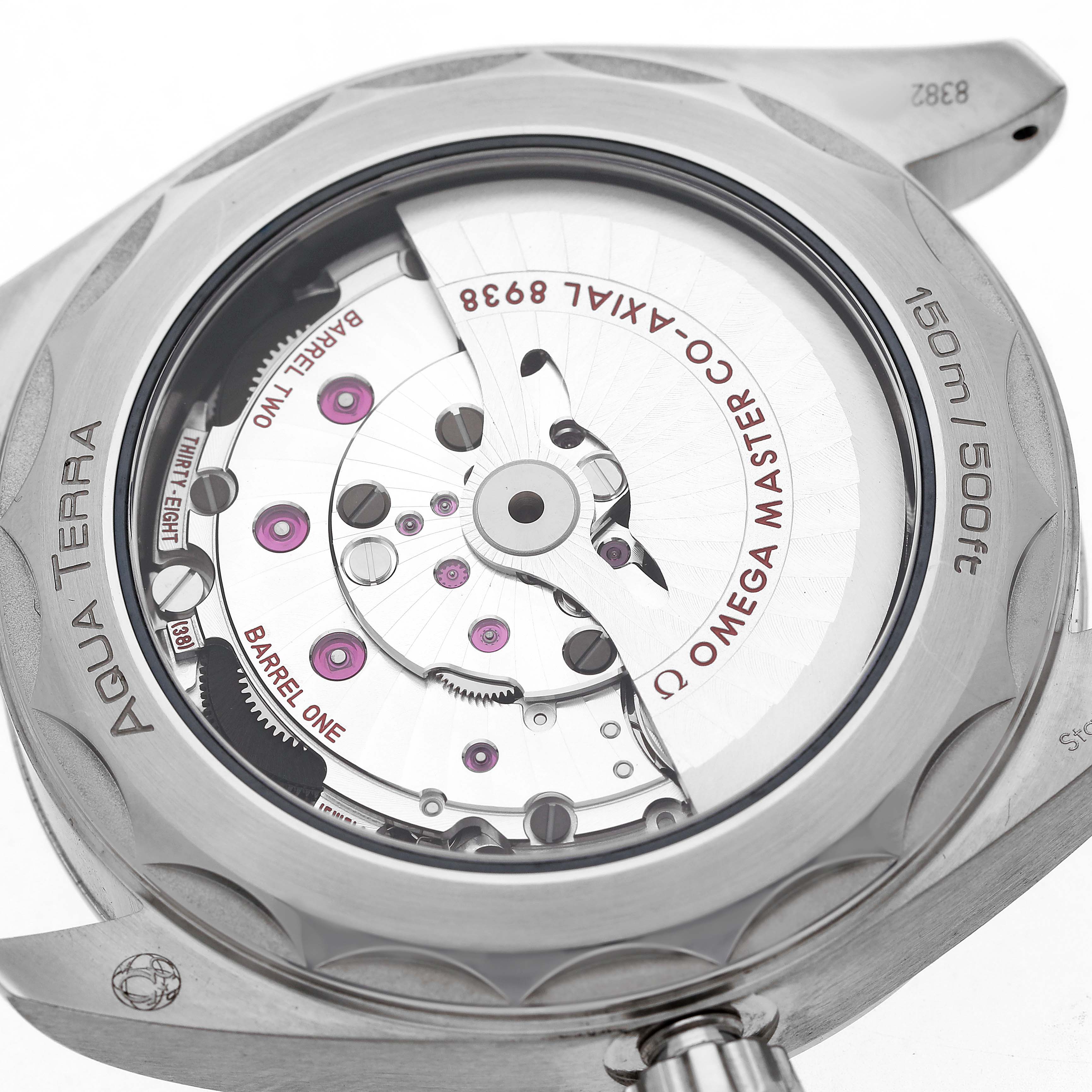 The image shows the back of an Omega Seamaster 220.12.43.22.03.001 Men's Stainless Steel Blue Dial watch, highlighting its intricate movement and inner mechanics.