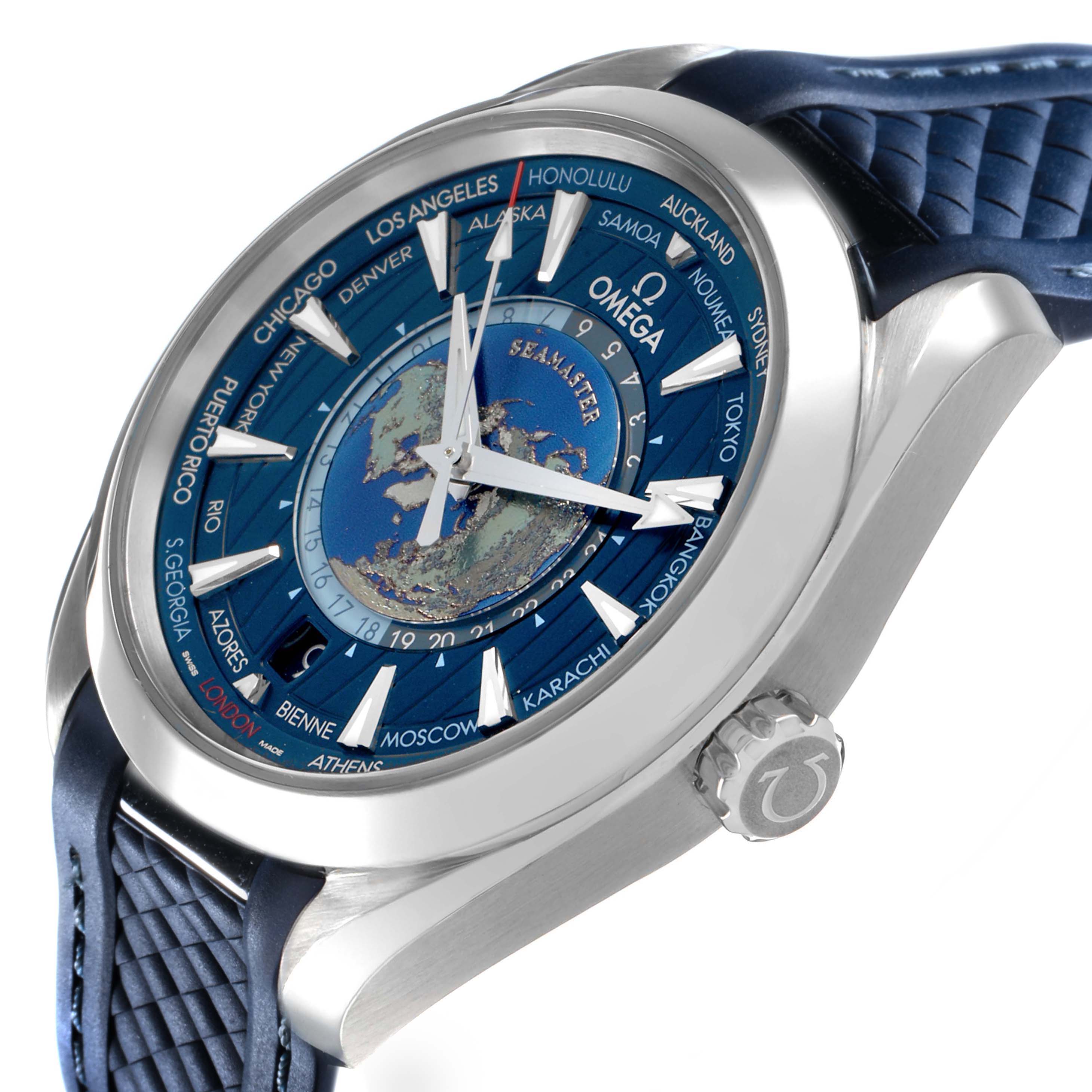 The Omega Seamaster 220.12.43.22.03.001 Men's Stainless Steel Blue Dial watch is shown from a side angle, highlighting the blue strap, silver case, and world-time dial.