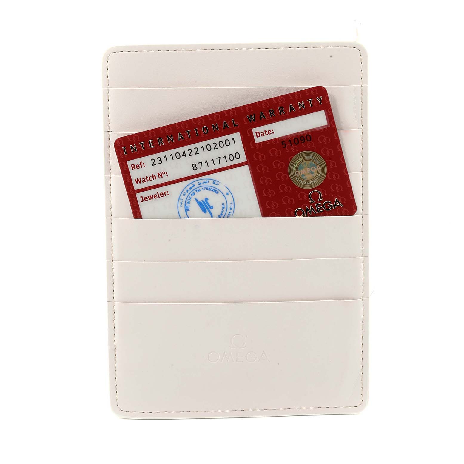 This image shows an Omega Aqua Terra 231.10.42.21.02.001 Men
s Stainless Steel Silver Dial 231.10.42.21.02.001 Men
s Stainless Steel Silver Dial model
s international warranty card and its white cardholder, photographed from a top-down angle.