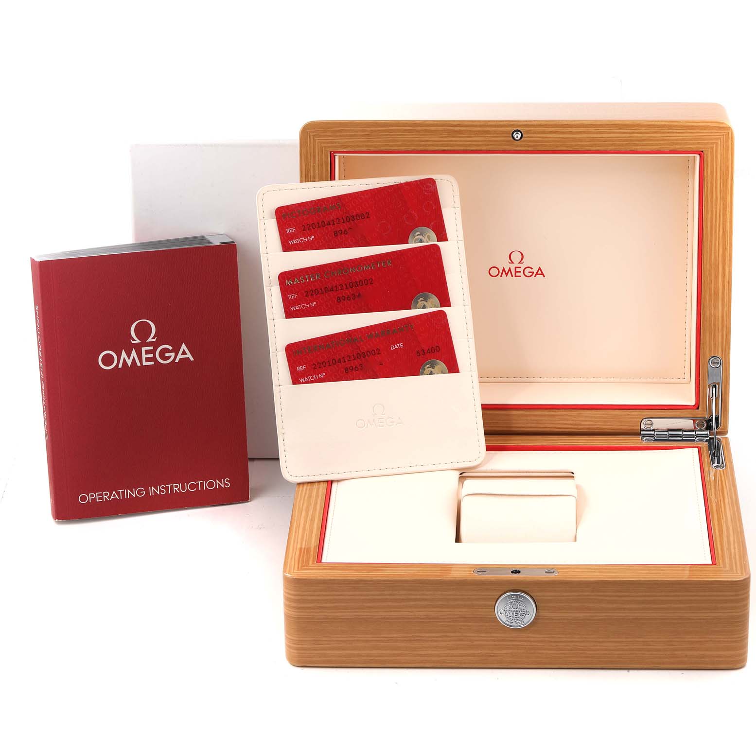 The image shows the packaging and accessories for the Omega Aqua Terra 220.10.41.21.03.002 Men's Stainless Steel Blue Dial 220.10.41.21.03.002 Men's Stainless Steel Blue Dial watch, including the box, operating instructions, and warranty cards.