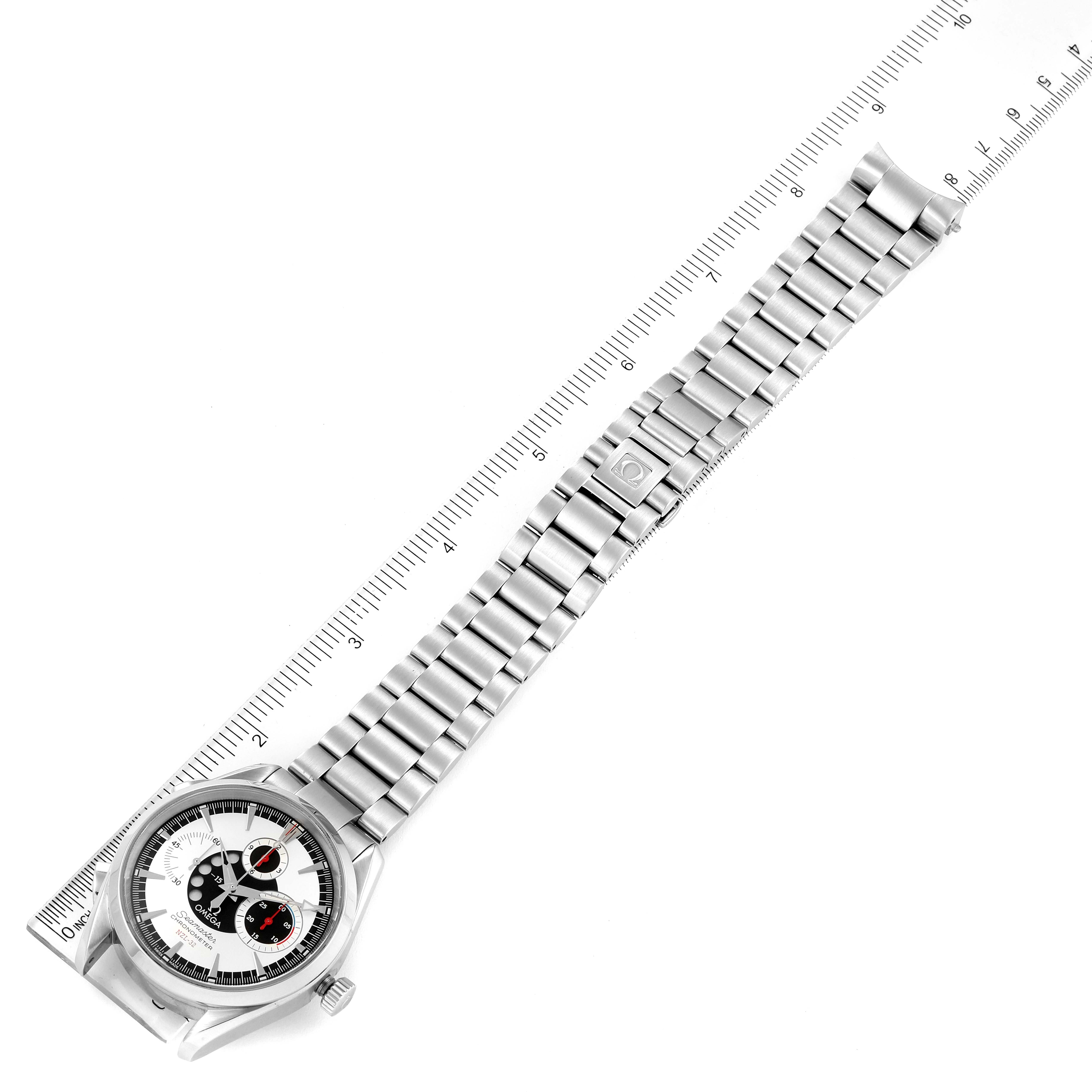 The image shows the Omega Aqua Terra 2513.30.00 Men
s Stainless Steel Silver Dial 2513.30.00 Men
s Stainless Steel Silver Dial watch laid flat with the dial and full metal bracelet visible alongside a ruler.