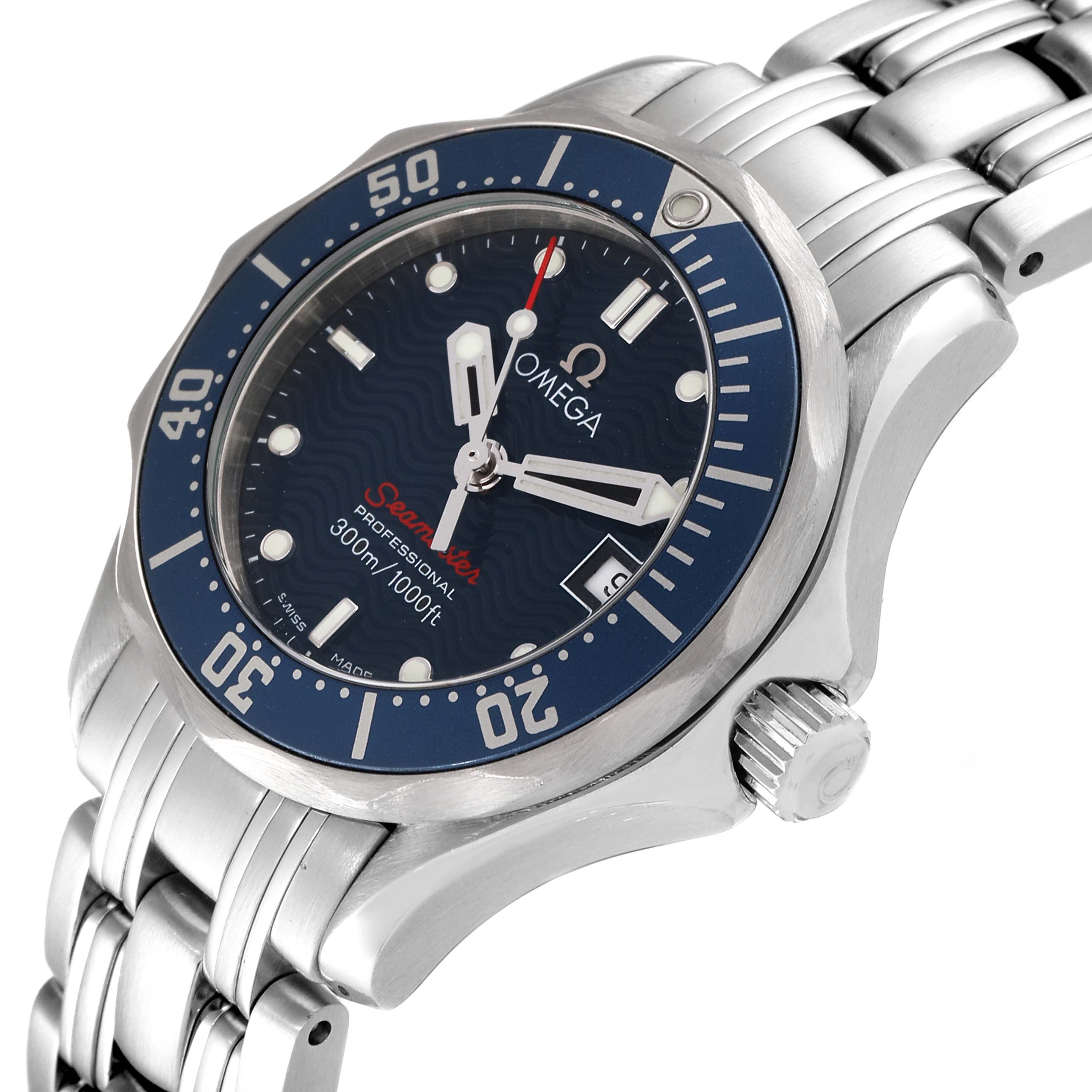 This image shows the face, bezel, and part of the bracelet of the Omega 2224.80.00 Women's Stainless Steel Blue Dial 2224.80.00 Women's Stainless Steel Blue Dial Seamaster Diver 300M 28mm Steel Ladies Watch 2224.80.00 at an angle.