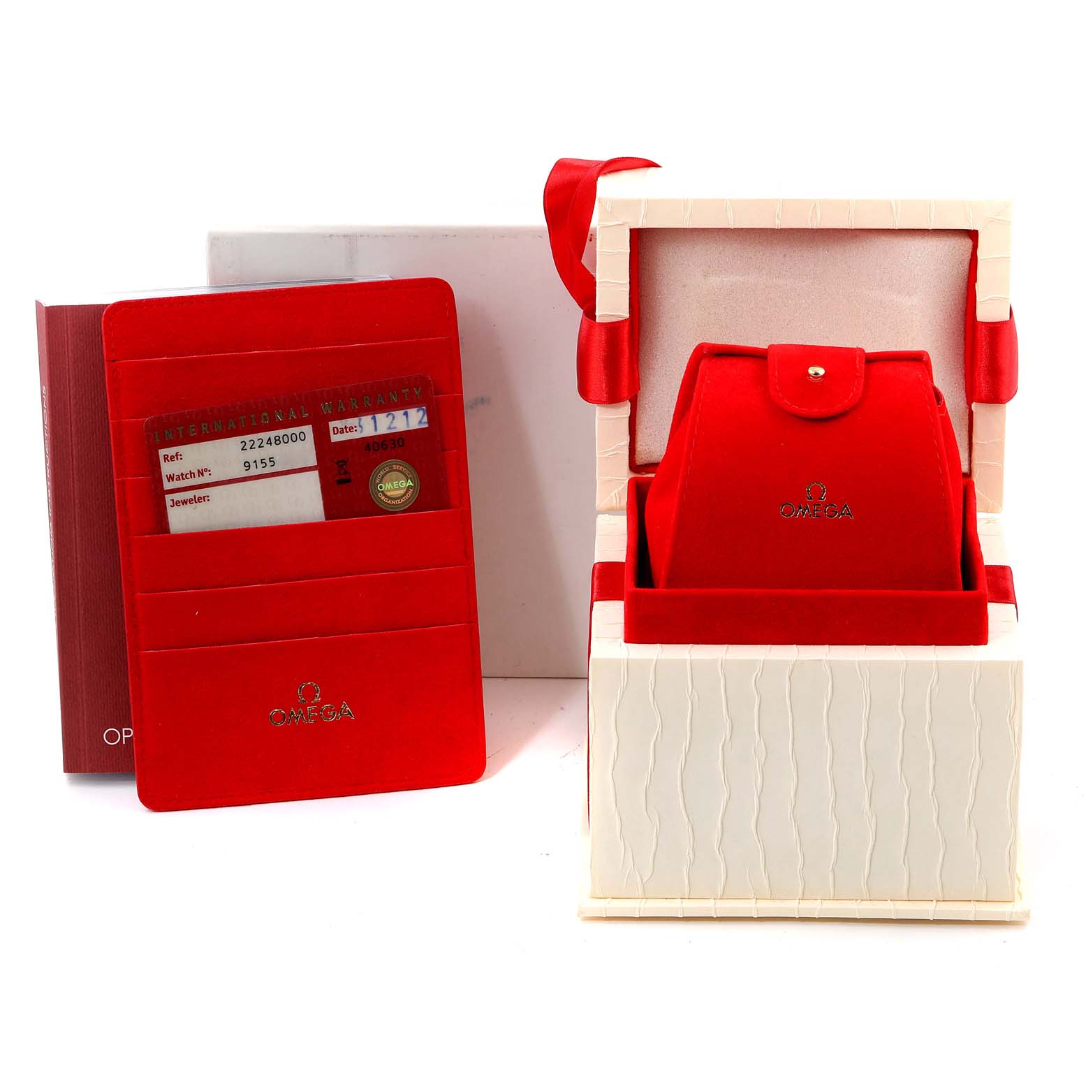 This image shows the box, warranty card, and packaging for the Omega 2224.80.00 Women's Stainless Steel Blue Dial 2224.80.00 Women's Stainless Steel Blue Dial Seamaster Diver 300M 28mm Steel Ladies Watch 2224.80.00.