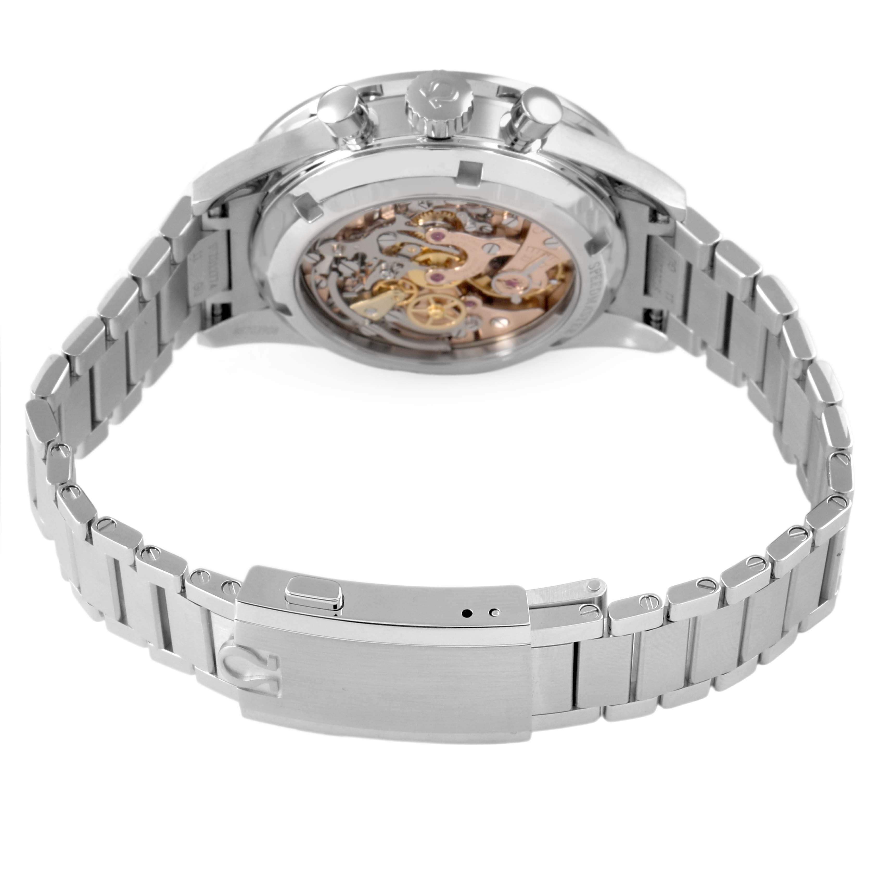 The Omega Speedmaster 311.30.40.30.01.001 Men's Stainless Steel Black Dial watch is shown from a rear angle, highlighting its open case back and detailed movement.