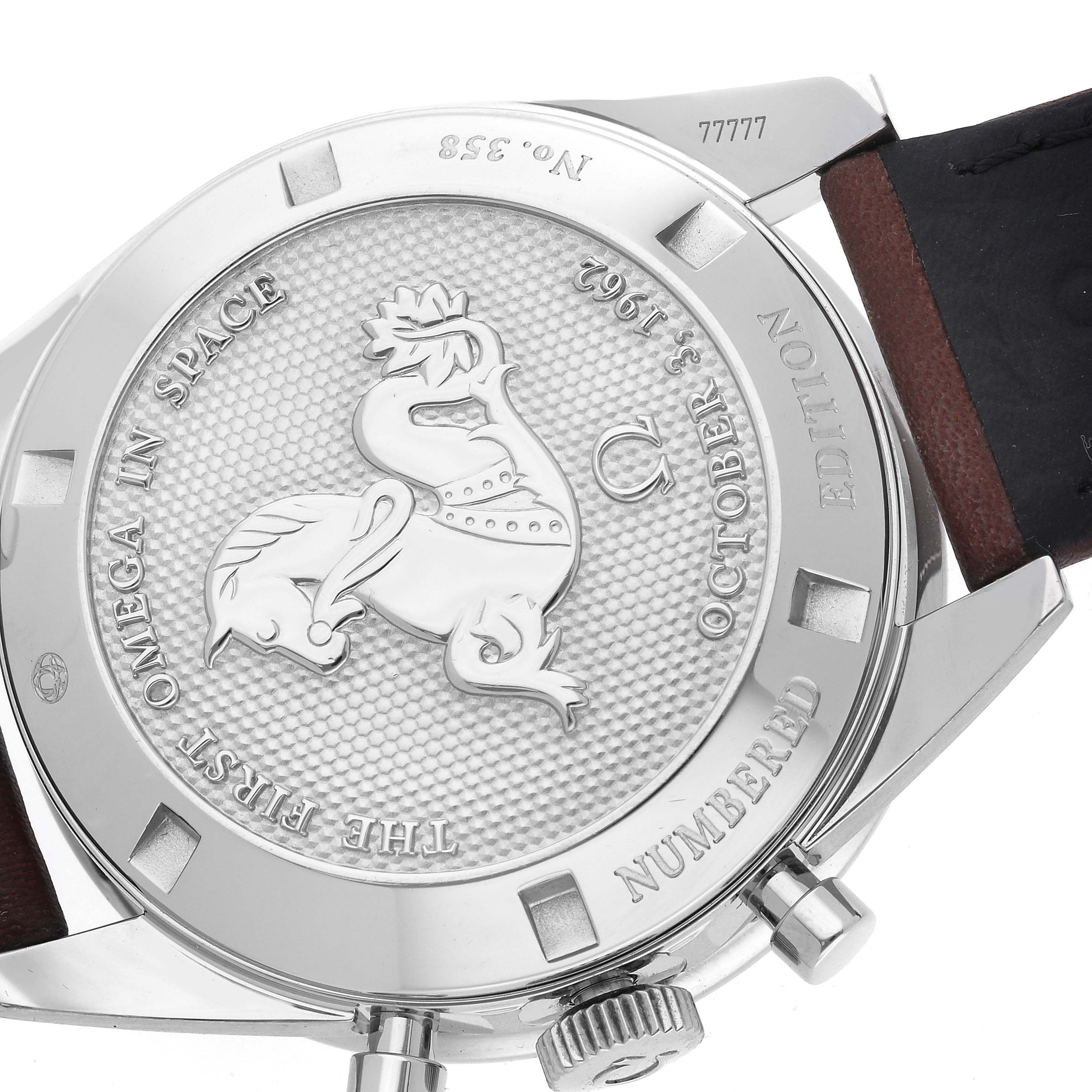 The image shows the case back of an Omega Speedmaster 311.32.40.30.01.001 Men's Stainless Steel Black Dial 311.32.40.30.01.001 Men's Stainless Steel Black Dial, featuring engraved details and a leather strap attachment.