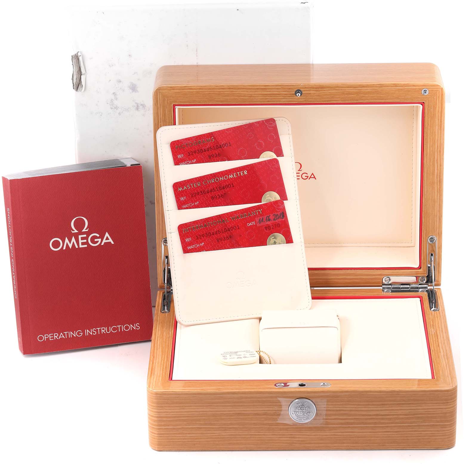 This image shows the packaging, warranty cards, and operating instructions for the Omega Speedmaster 329.30.44.51.04.001 Men
s Stainless Steel White Dial 329.30.44.51.04.001 Men
s Stainless Steel White Dial watch.