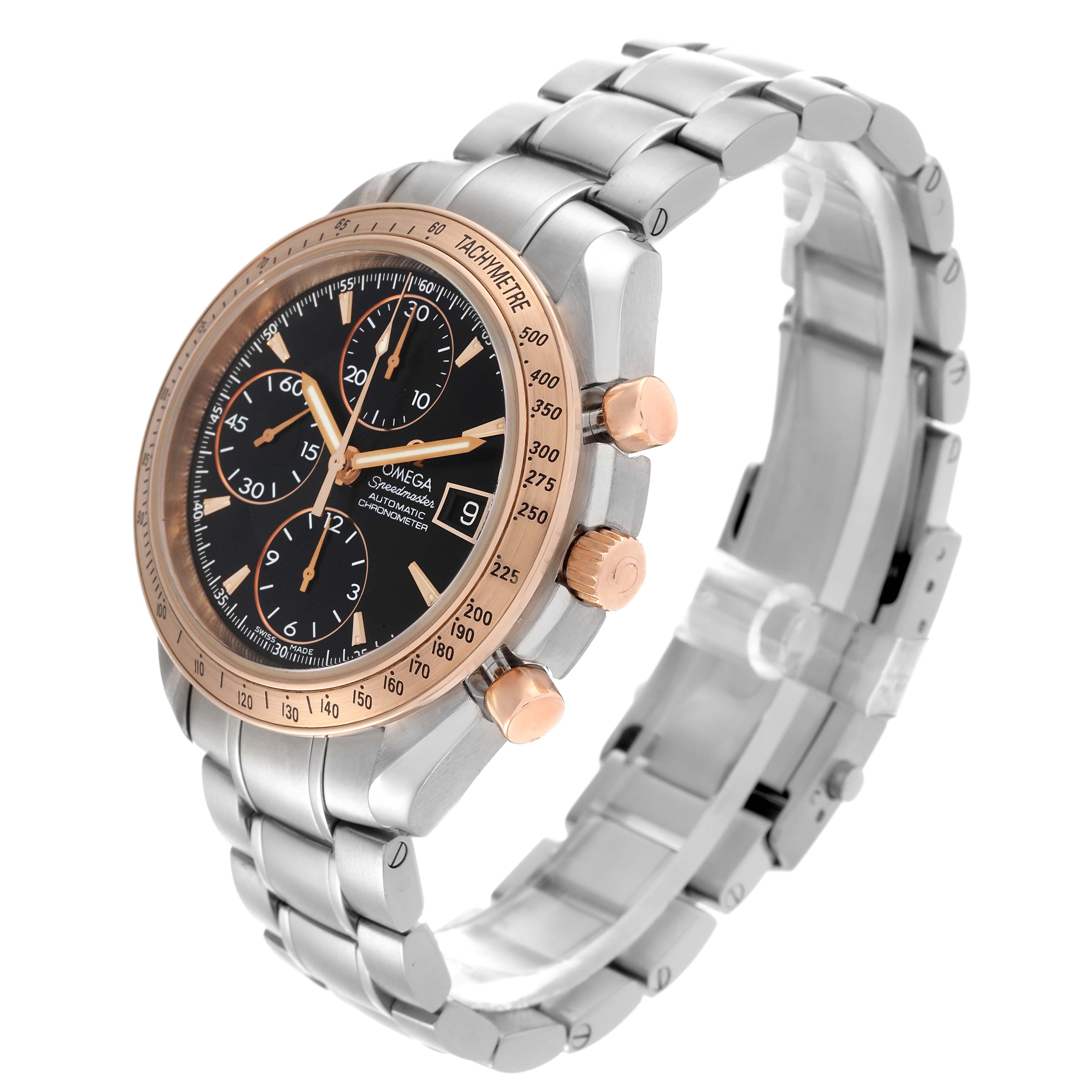 The Omega Speedmaster 323.21.40.40.01.001 Men's Steel and Gold (two tone) Black Dial 323.21.40.40.01.001 Men's Steel and Gold (two tone) Black Dial watch is shown at a three-quarter angle, highlighting the dial, bezel, chrono pushers, and bracelet.
