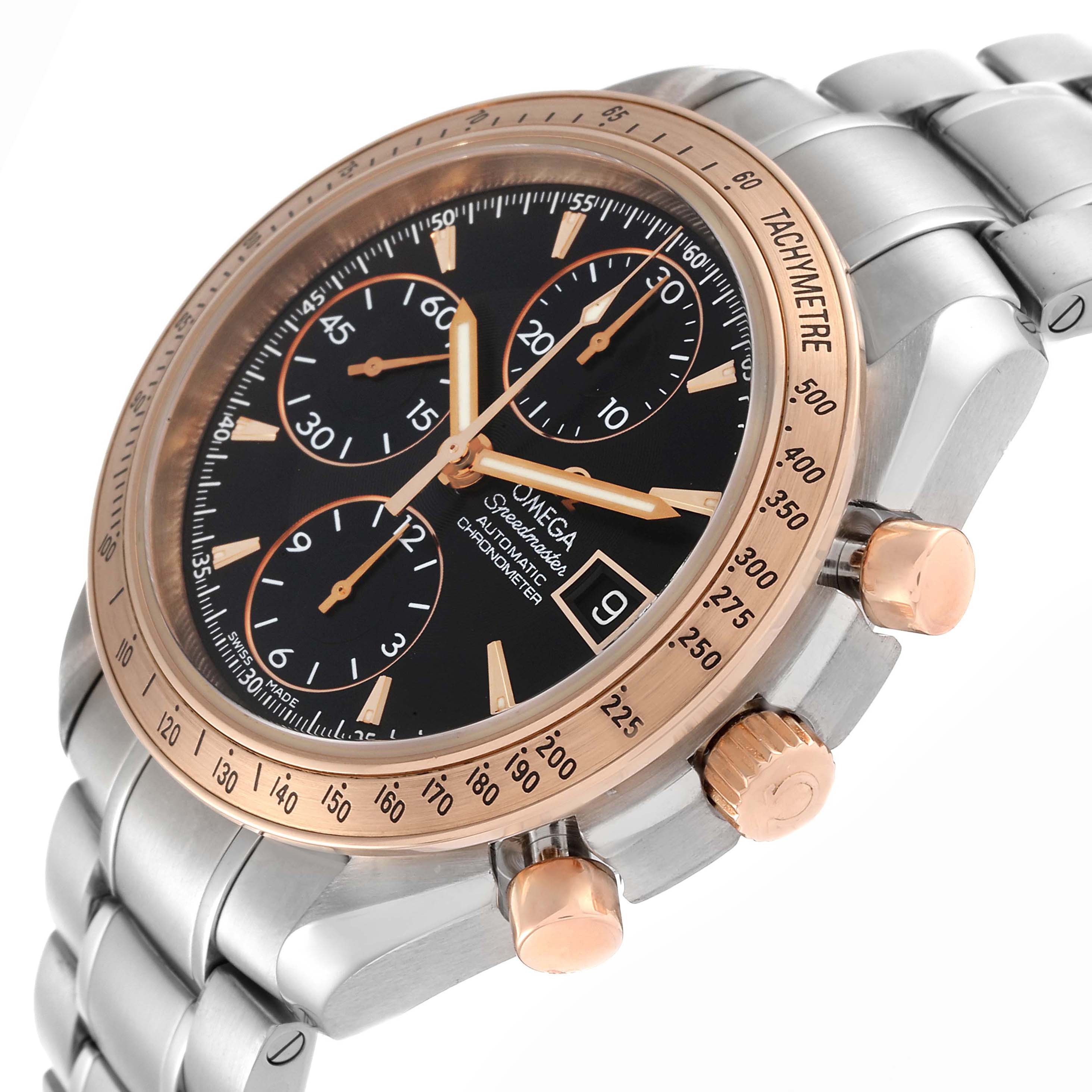 The Omega Speedmaster 323.21.40.40.01.001 Men's Steel and Gold (two tone) Black Dial 323.21.40.40.01.001 Men's Steel and Gold (two tone) Black Dial is shown at a side angle, highlighting the dial, bezel, chronograph subdials, and crown with pushers.