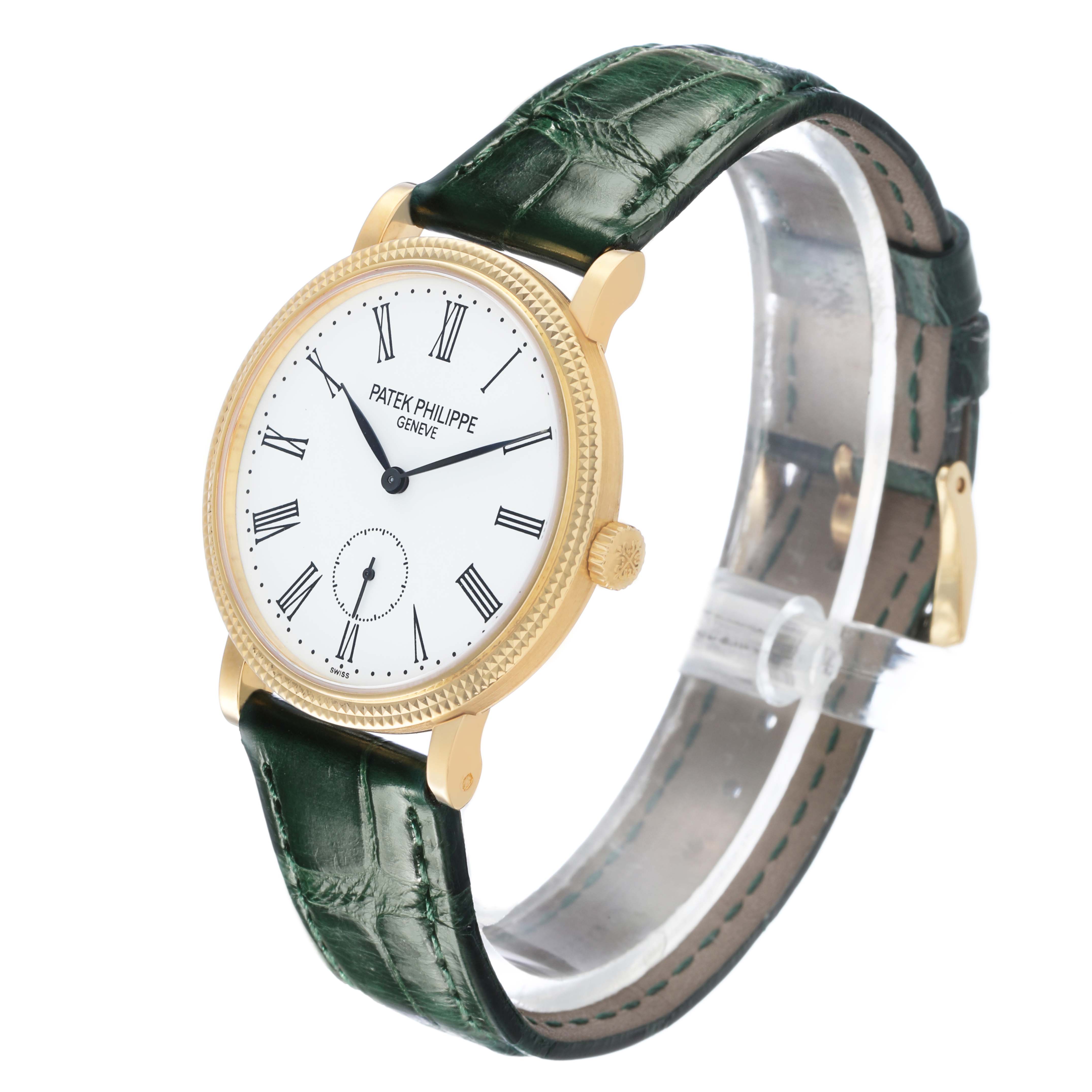 The Patek Philippe Calatrava 7119 / 7119J Women's Yellow Gold White Dial watch is shown at a slight angle, displaying the face, bezel, crown, and green leather strap.