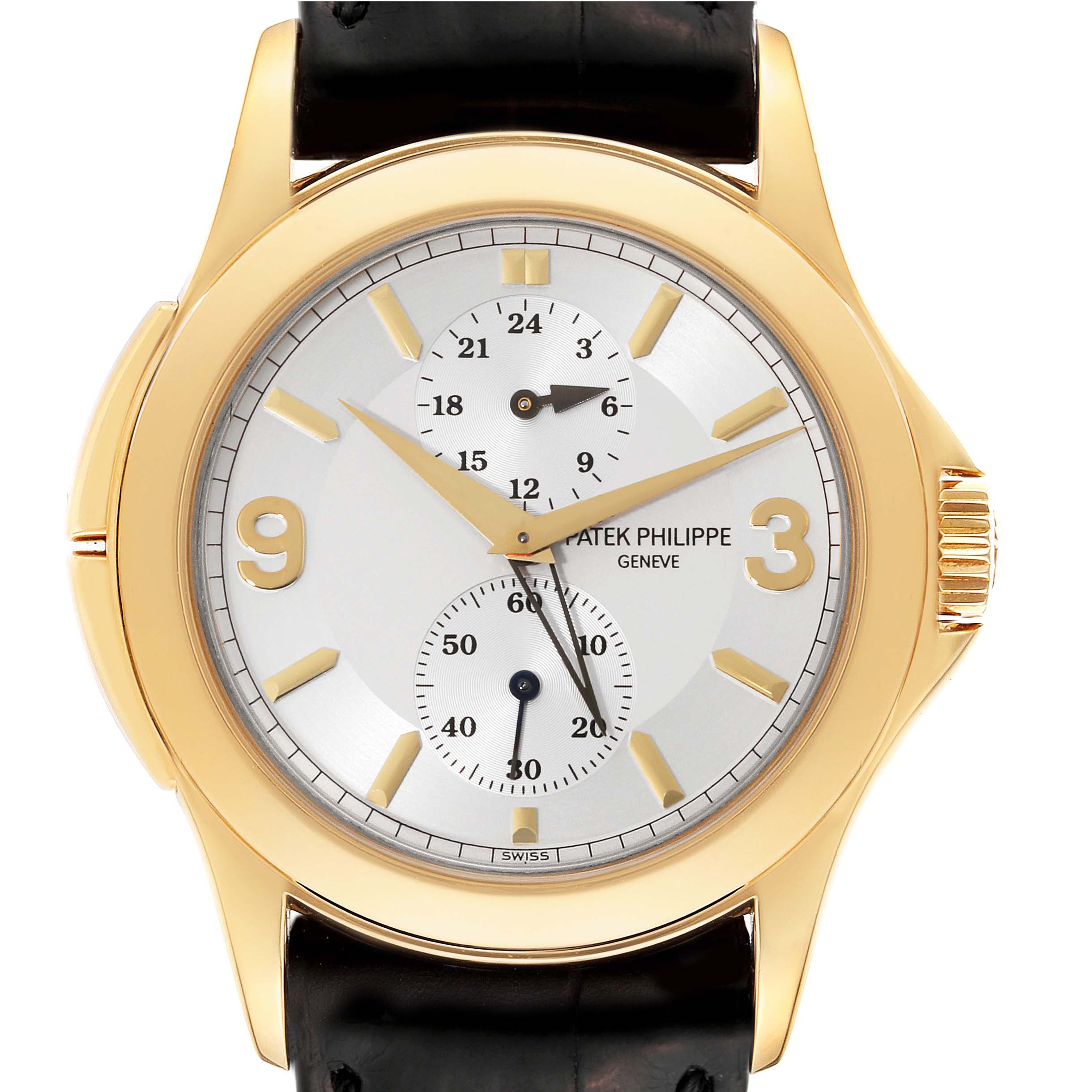 This is a frontal view of the Patek Philippe Calatrava 5134J Men's Yellow Gold Silver Dial 5134J Men's Yellow Gold Silver Dial model, showcasing the dial, hands, subdials, and part of the strap.