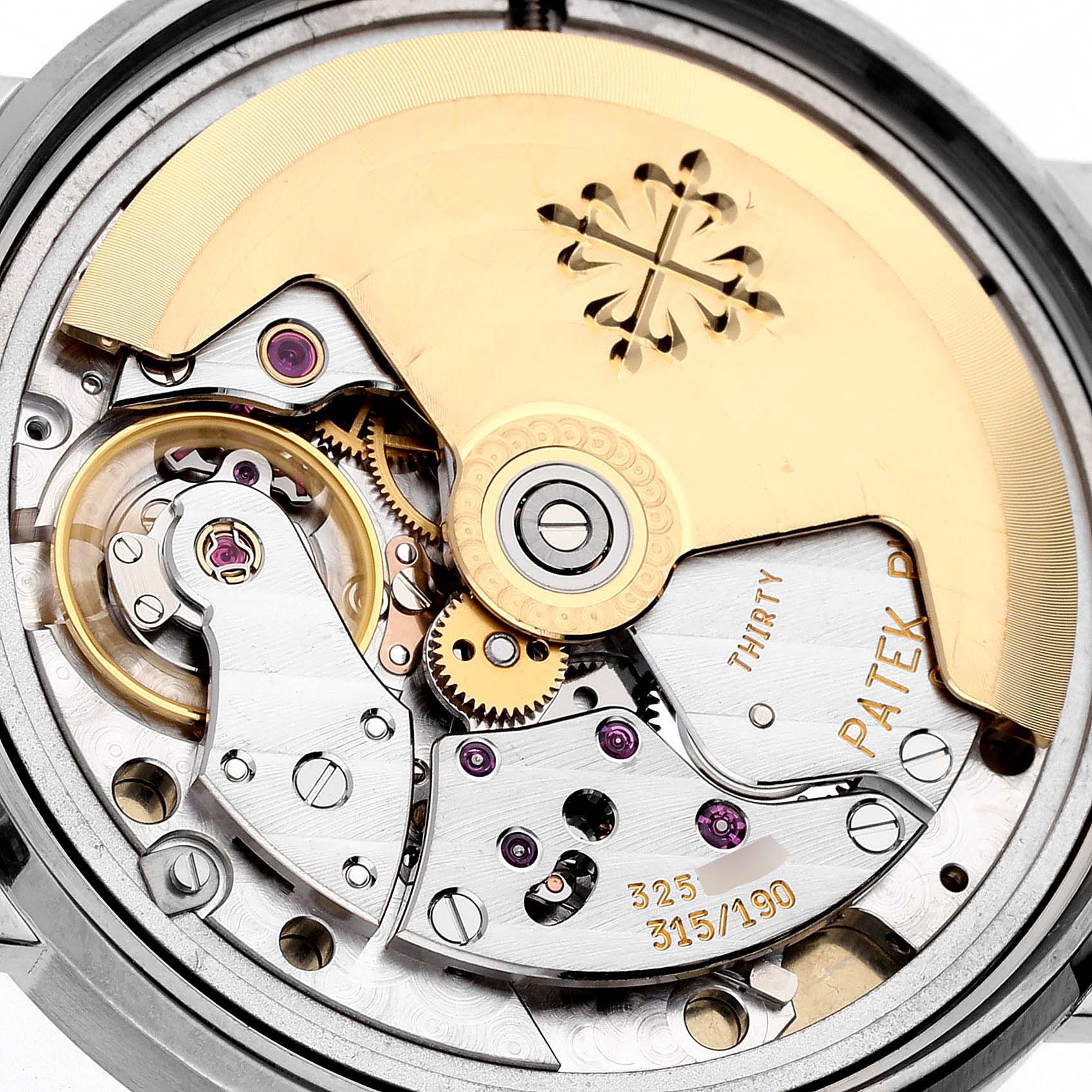 The image shows the intricate movement and rotor of a Patek Philippe Calatrava 3802/200G-001 Men's White Gold White Dial 3802/200G-001 Men's White Gold White Dial watch from a top-down angle.